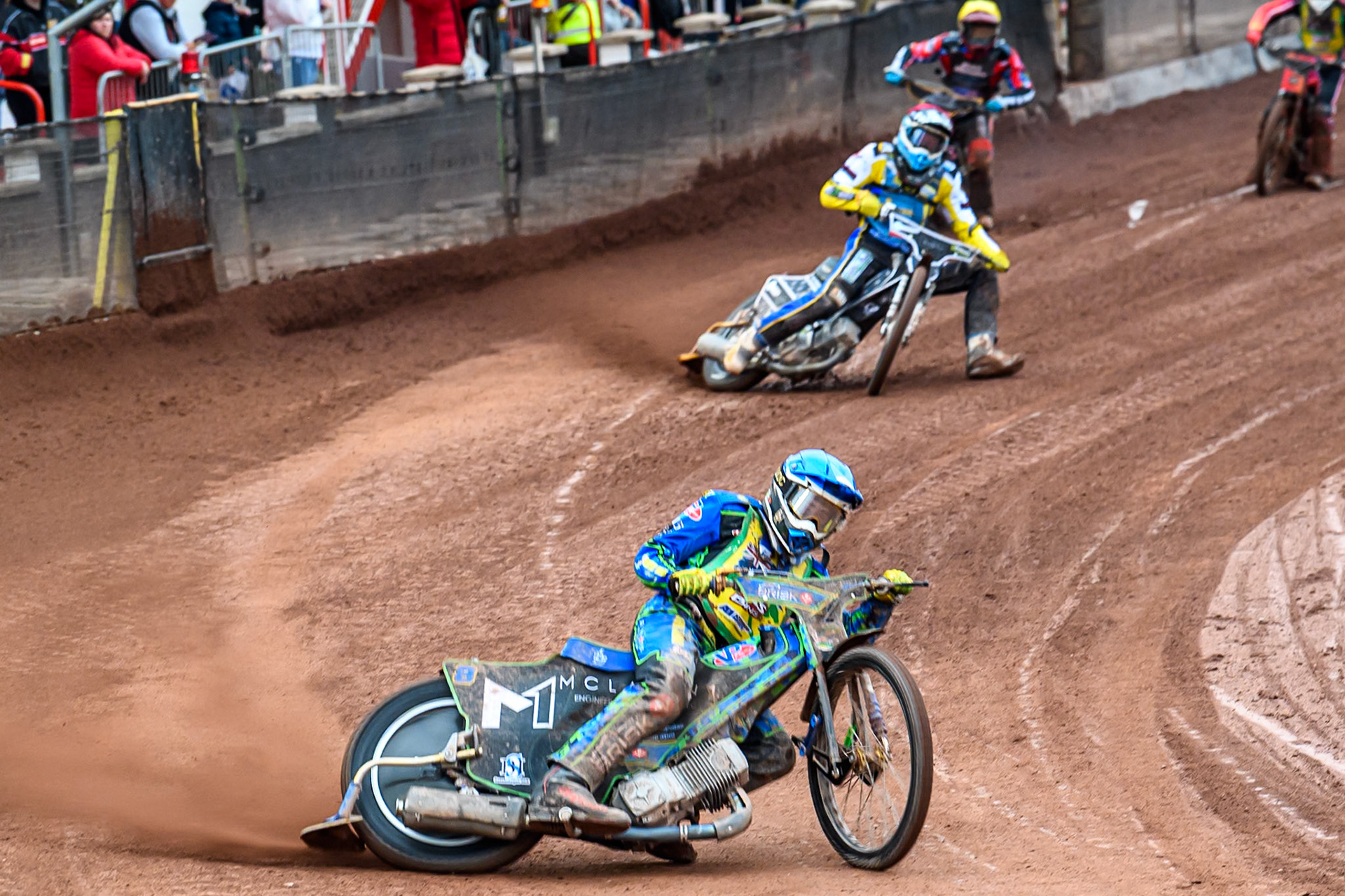 Michael West of Australia in Blue leading Noel Wahlquist of Sweden in Red and Timmy Dion of the United States in Yellow during the FIM SGP2 Qualifying Round at the Peugeot Ashfield Stadium in Glasgow on Saturday 24th May 2025. (Photo: Ian Charles | MI News)