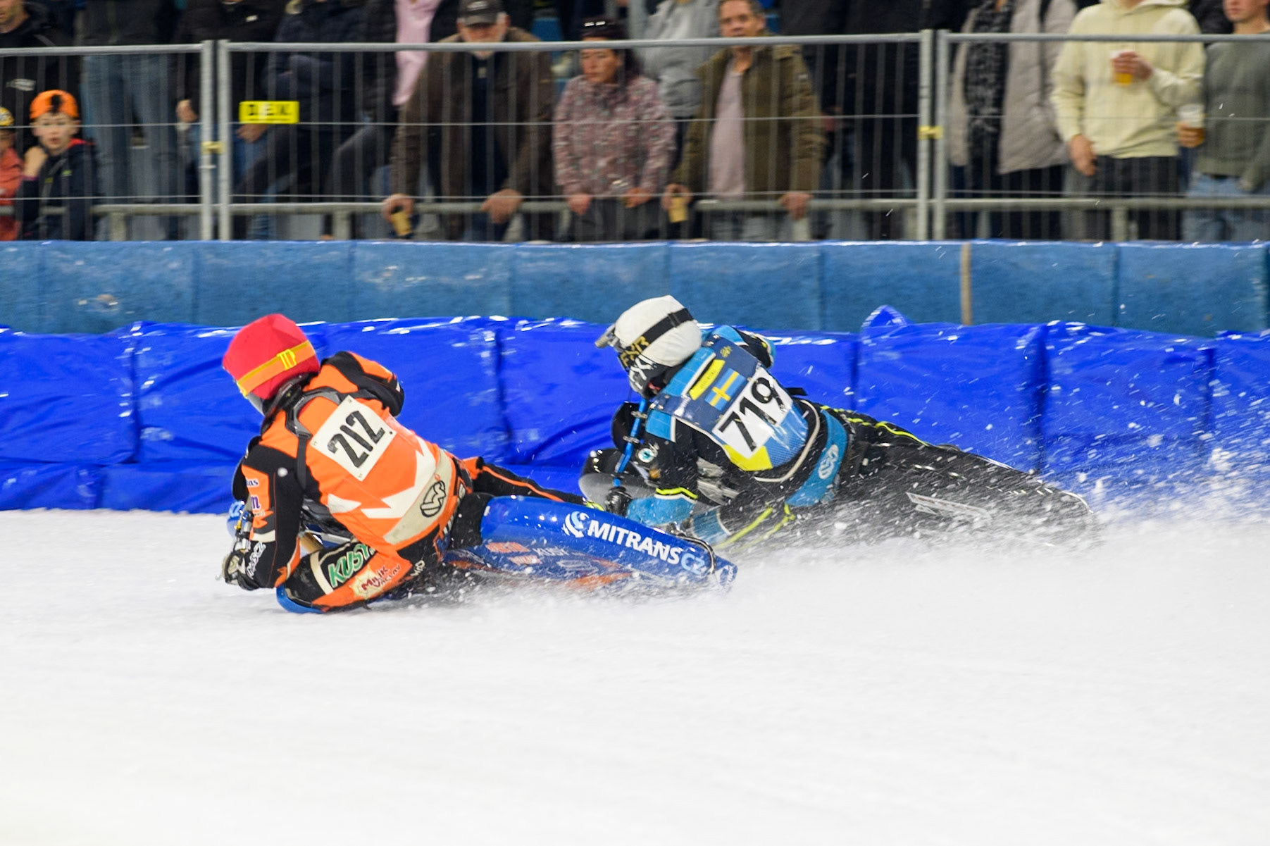 Lukas Hutla (212) of the Czech Republic in Red rides inside Filip Jäger (719) of Sweden in White during the FIM Ice Speedway Gladiators World Championship, Final 3 at the Ice Stadium, Thialf, Heerenveen on Saturday 5th April 2025. (Photo: Ian Charles | MI News)