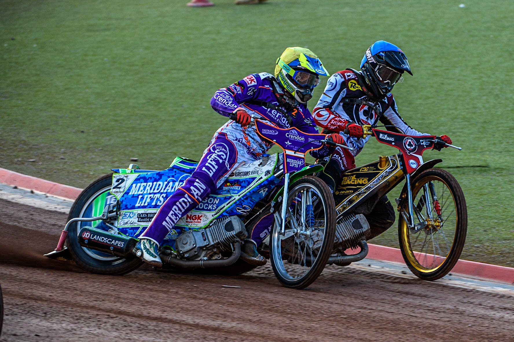 Hans Andersen  (Yellow) battles with Norick Blodorn  (Blue) during the SGB Premiership match between Belle Vue Aces and Peterborough at the National Speedway Stadium, Manchester on Monday 24th April 2023. (Photo: Ian Charles | MI News)