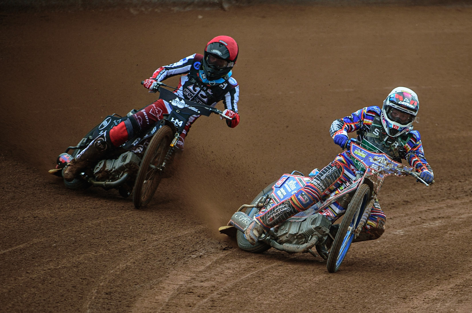 MANCHESTER, UK. APR 15TH  Henry Atkins  (White) inside Harry McGurk  (Red)  during the National Development League match between Belle Vue Colts and Plymouth Centurions at the National Speedway Stadium, Manchester on Friday 15th April 2022. (Credit: Ian Charles | MI News)