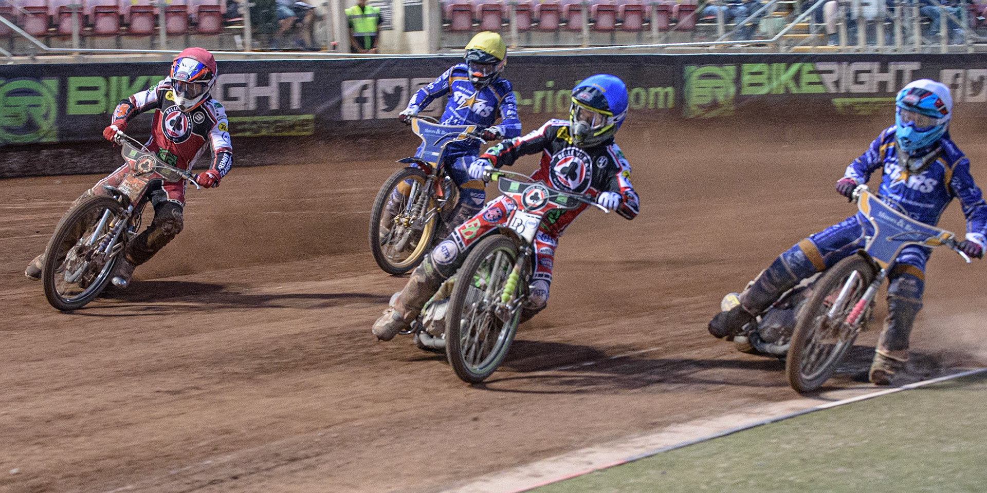 MANCHESTER, UK. AUGUST 23RD    Charles Wright  (Blue) and Steve Worrall  (Red) lead Thomas Jorgensen  (White) and Connor Mountain  (Yellow) during the SGB Premiership match between Belle Vue Aces and King's Lynn Stars at the National Speedway Stadium, Manchester on Monday 23rd August 2021. (Credit: Ian Charles | MI News)
