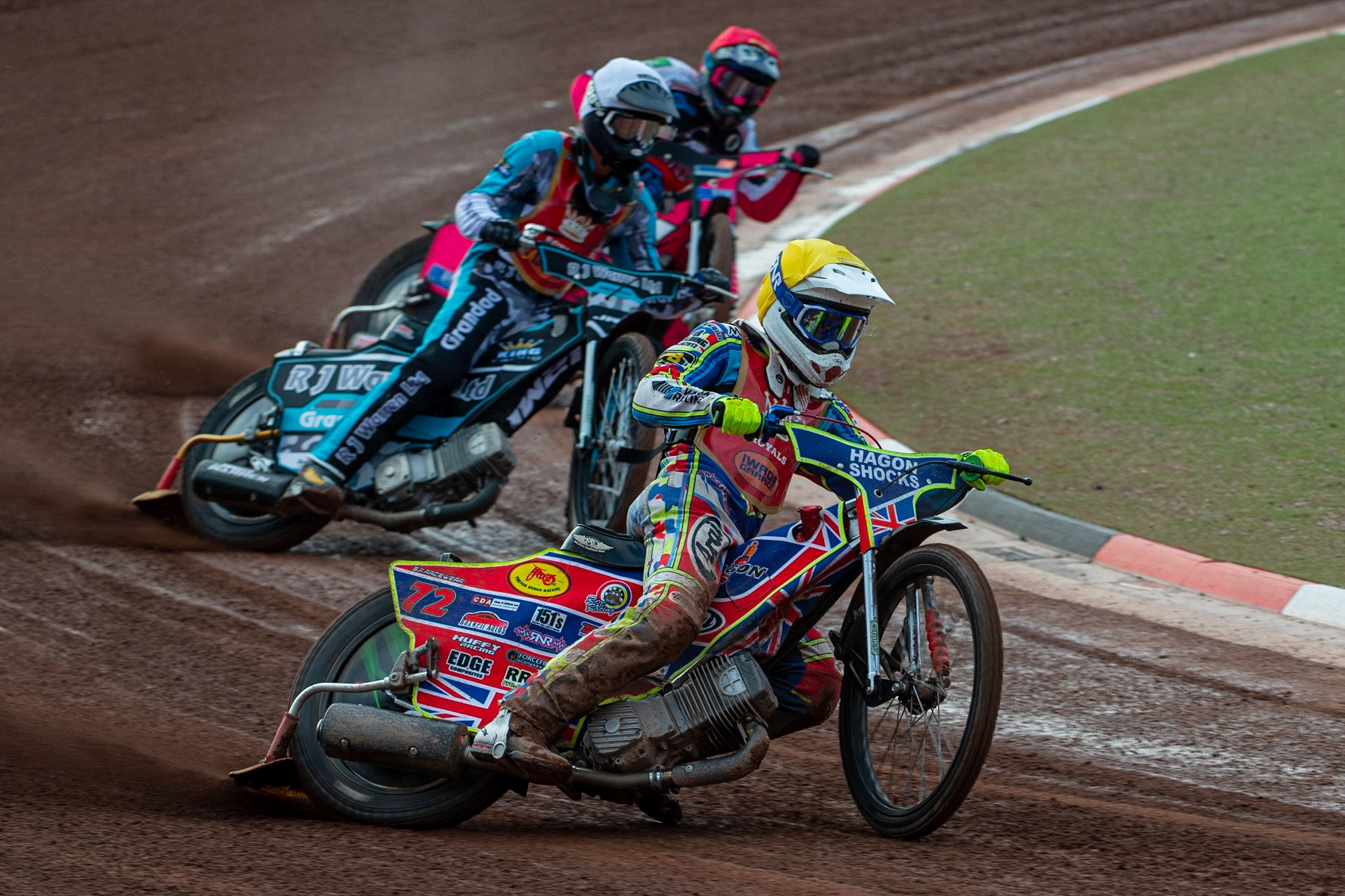 MANCHESTER, UK. JULY 2ND  Jake Mulford  (Yellow) leads Josh Warren  (White) and Sam Woolley  (Red)during the National Development League match between Belle Vue Colts and Kent Royals at the National Speedway Stadium, Manchester on Friday 2nd July 2021. (Credit: Ian Charles | MI News)
