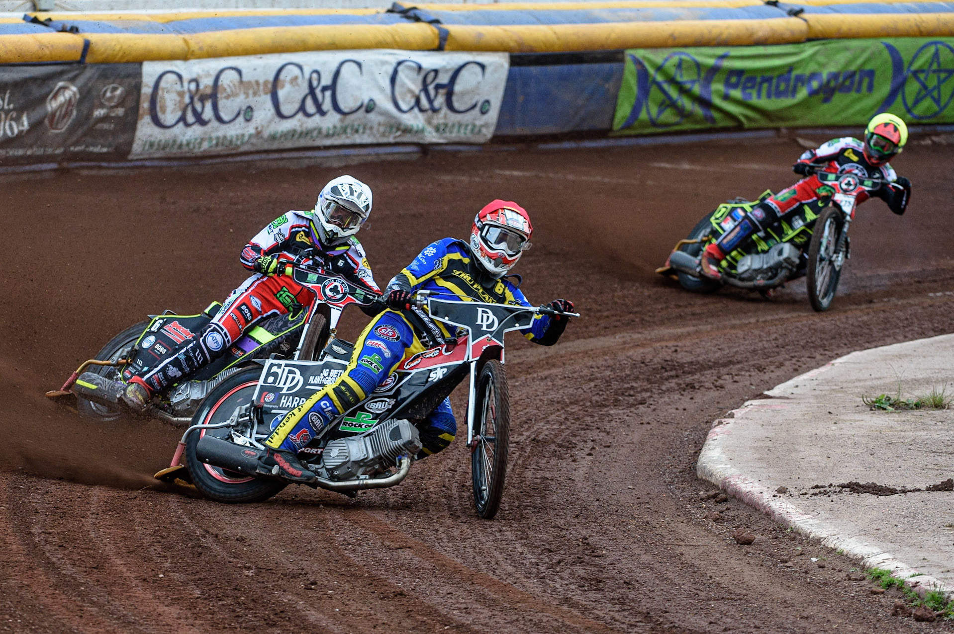 SHEFFIELD, UK. JULY 1ST     James Wright (Red) leads Tom Brennan (White) and Jye Etheridge  (Yellow) during the SGB Premiership match between Sheffield Tigers and Belle Vue Aces at Owlerton Stadium, Sheffield on Thursday 1st July 2021. (Credit: Ian Charles | MI News)