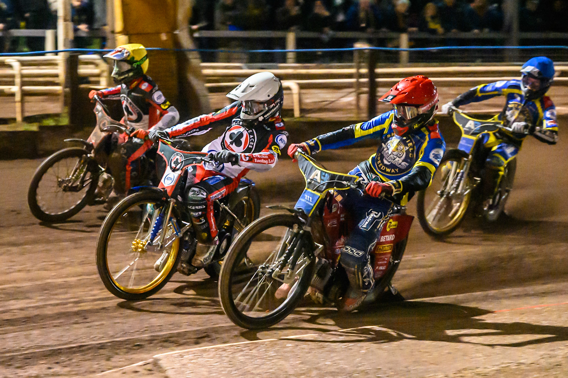 Jason Doyle of Belle Vue Aces in White rides outside Max Fricke, Guest Rider for Sheffield Tigers in Red , Will Cairns of Belle Vue Aces in Yellow  and Anders Rowe of Sheffield Tigers in Blue during the Rowe Motor Oil Premiership Grand Final 1st Leg match between Sheffield Tigers and Belle Vue Aces at Owlerton Stadium, Sheffield on Monday 12th October 2026. (Photo: Ian Charles | MI News)