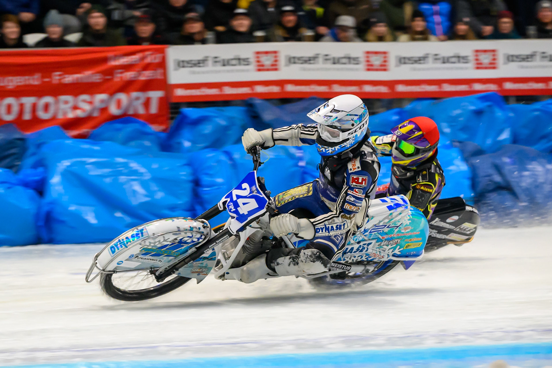 Max Koivula (24) of Finland  in White passes Max Niedermaier (88) of Germany  in Red during the Ice Speedway Gladiators World Championship Final 2 at Max-Aicher-Arena, Inzell on Sunday 15th March 2026. (Photo: Ian Charles | MI News)