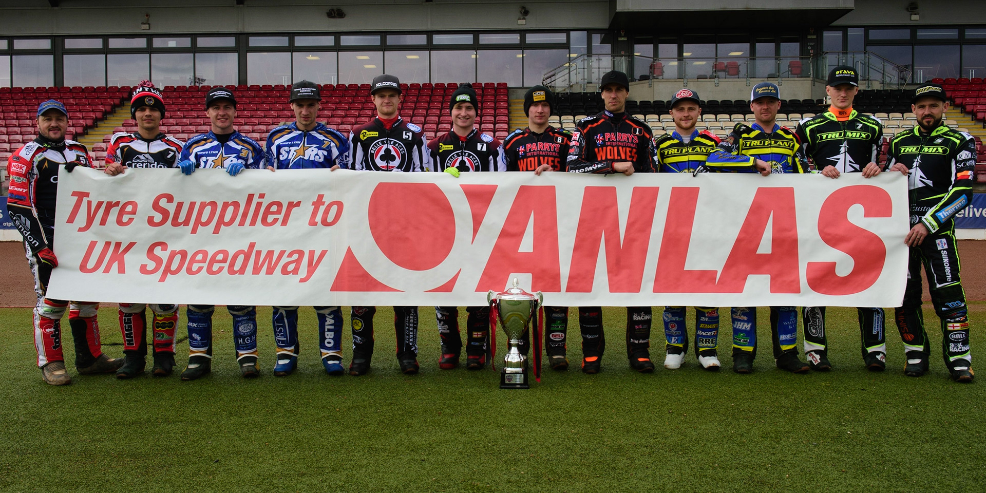 MANCHESTER, UK. APRIL 12TH: All the riders present with the Tyre Sponsor Banner at the Discovery Networks Eurosport Speedway Season Launch at the National Speedway Stadium, Manchester on Tuesday 12th April 2022 (Credit: Ian Charles | MI News)
