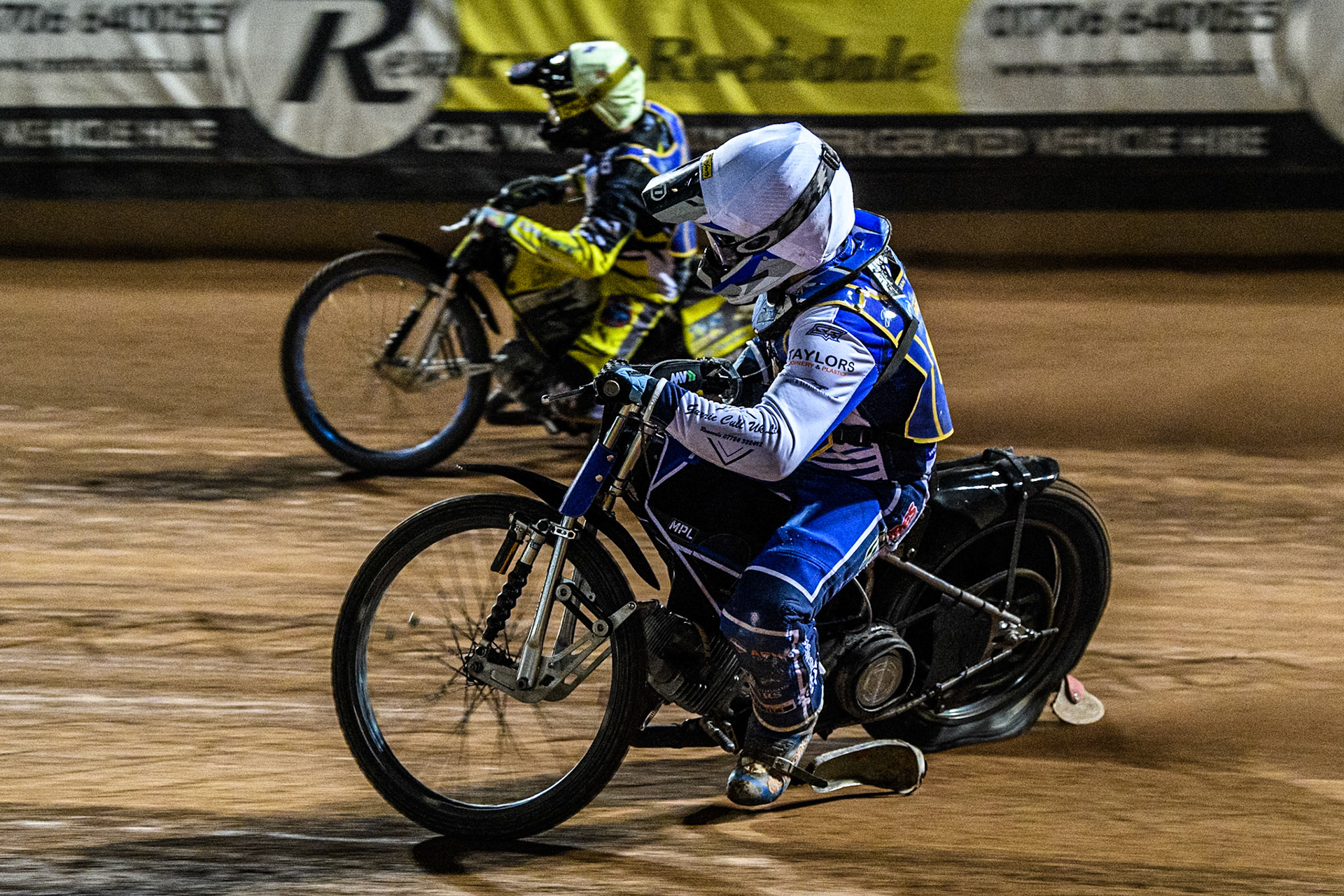 Edinburgh Monarchs' Sam McGurk loses his steel shoe whilst chasing Edinburgh Monarchs' Dayle Wood in Yellow during the WSRA National Development League match between Belle Vue Aces and Edinburgh Monarchs at the National Speedway Stadium, Manchester on Friday 30th August 2024. (Photo: Ian Charles | MI News)