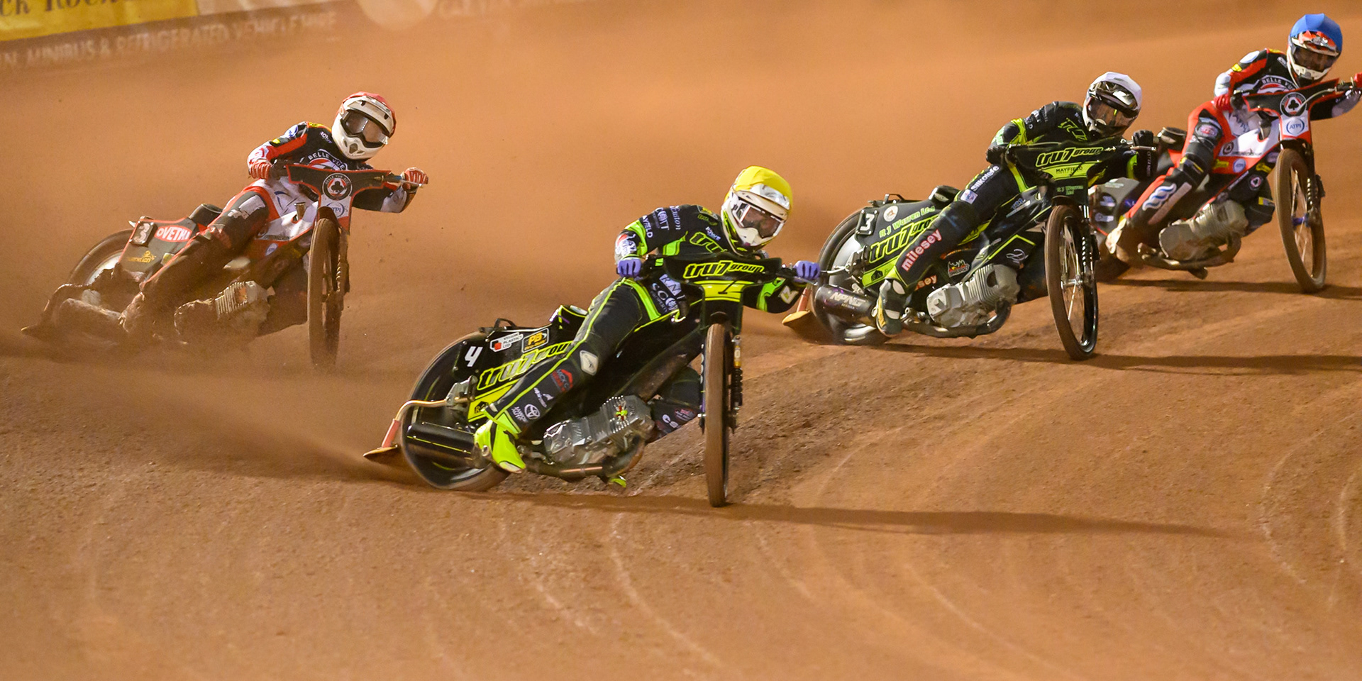 Tom Brennan of Ipswich Witches in Yellow leading Peter Kildemand of Belle Vue Aces in Red, Danny King of Ipswich Witches in White and Zach Cook of Belle Vue Aces in Blue  during the Rowe Motor Oil Premiership Play Off Semi Final 2nd leg match between Belle Vue Aces and Ipswich Witches at the National Speedway Stadium, Manchester on Monday 28th September 2026. (Photo: Ian Charles | MI News)