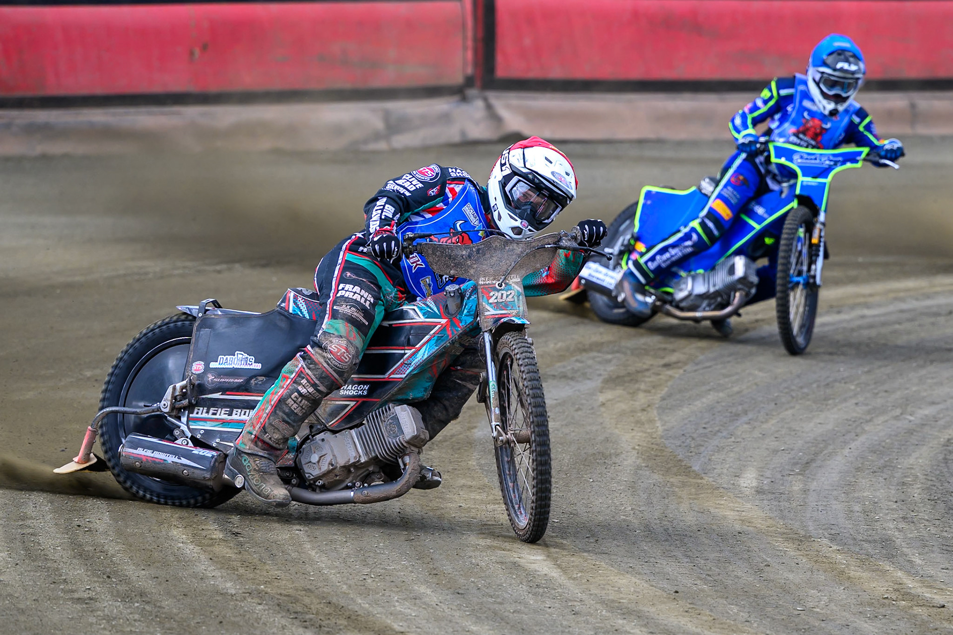 Alfie Bowtell of Buxton Bulls  in Red leading team mate Arran Butcher of Buxton Bulls in Blue during the  Challenge match between Buxton Bulls and NDL Nomads at Hi-Edge Speedway, Buxton on Sunday 19th April 2026. (Photo: Ian Charles | MI News)