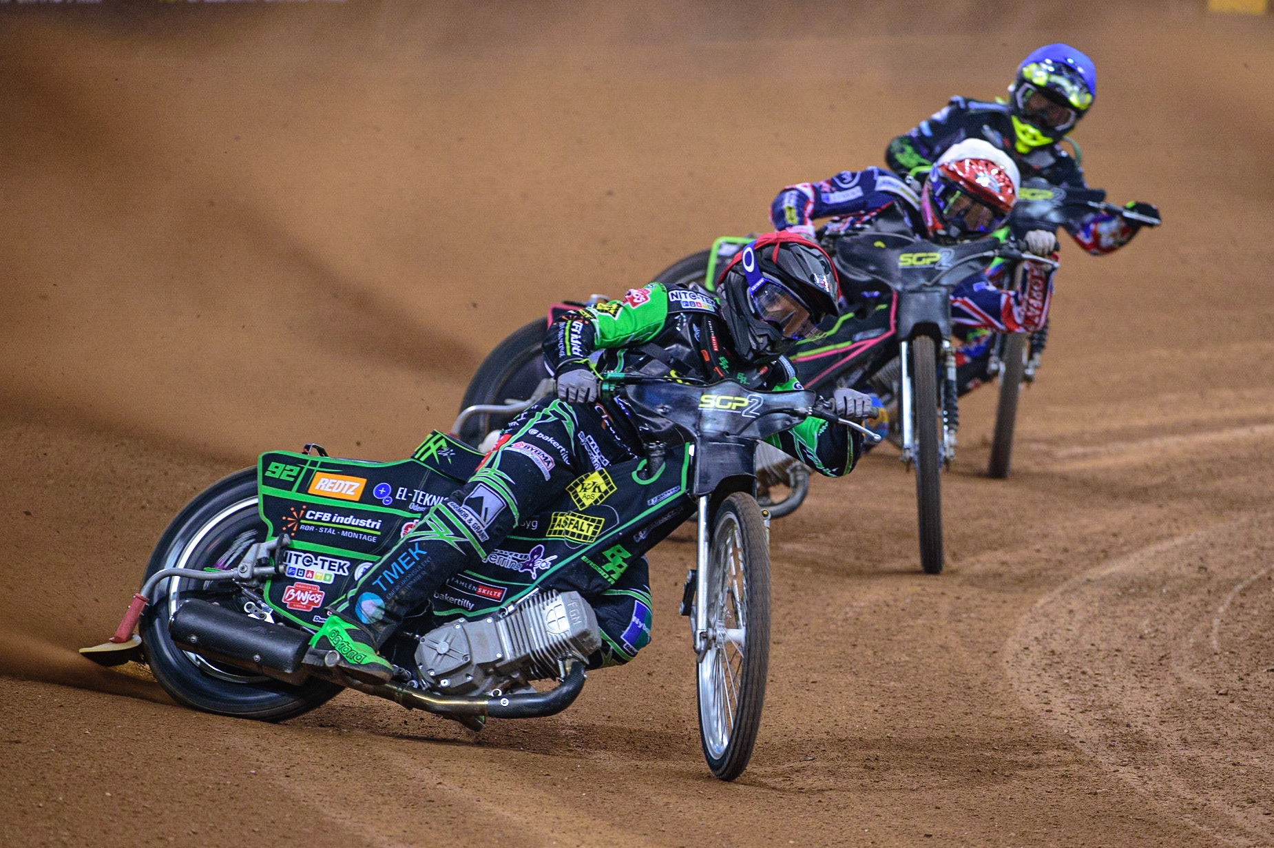 Benjamin Basso (Denmark)  (Red) leads Leon Flint (Great Britain)  (White) and Tom Brennan (Great Britain)  (Blue) during the FIM  Speedway Grand Prix  2 of Great Britain at the Principality Stadium, Cardiff on Sunday 14th August 2022. (Credit: Ian Charles | MI News)