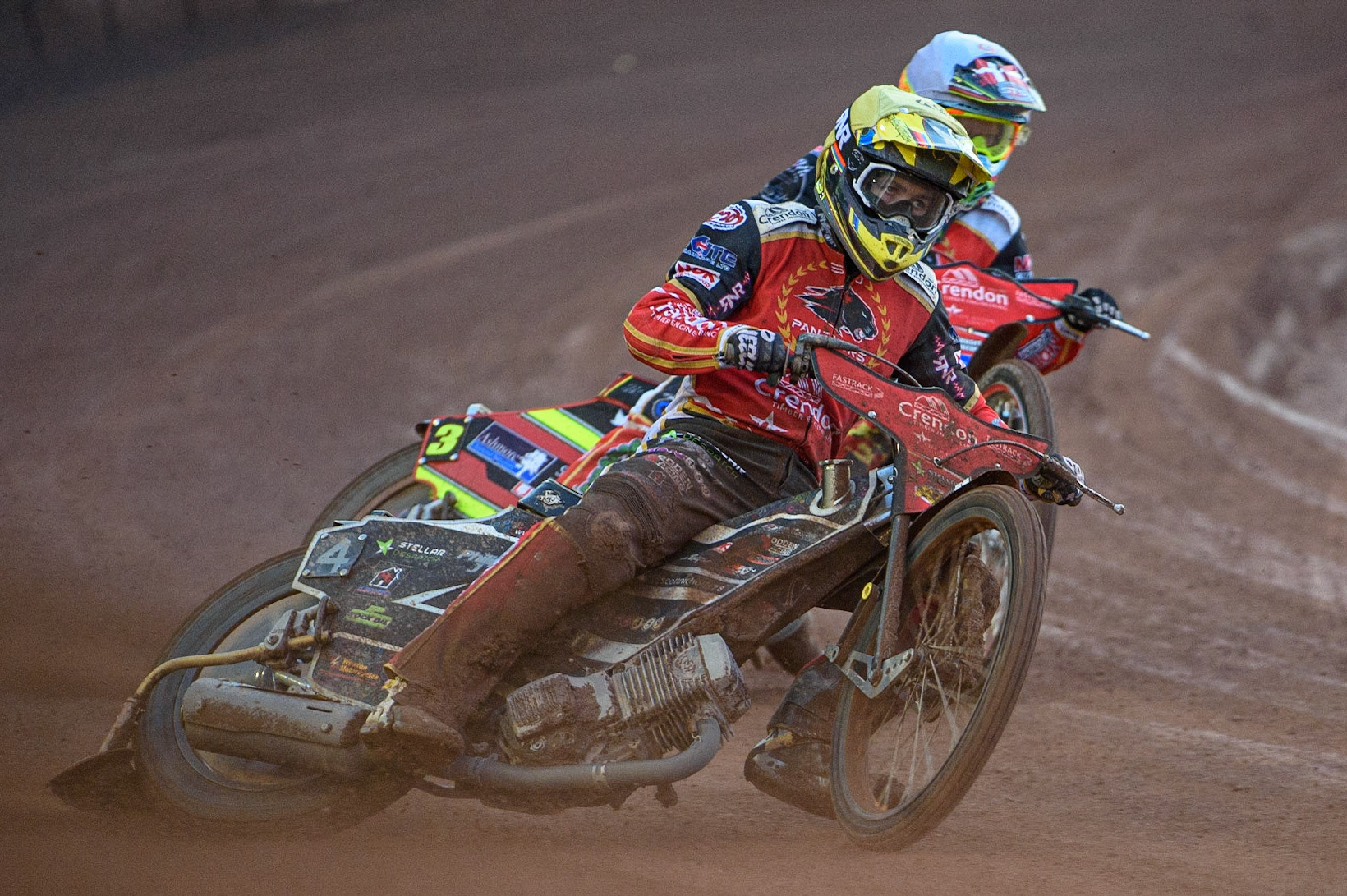MANCHESTER, UK. AUG 9TH Scott Nicholls  (Yellow) leads Michael Palm Toft  (White)  during the SGB Premiership match between Belle Vue Aces and Peterborough at the National Speedway Stadium, Manchester on Monday 9th August 2021. (Credit: Ian Charles | MI News)