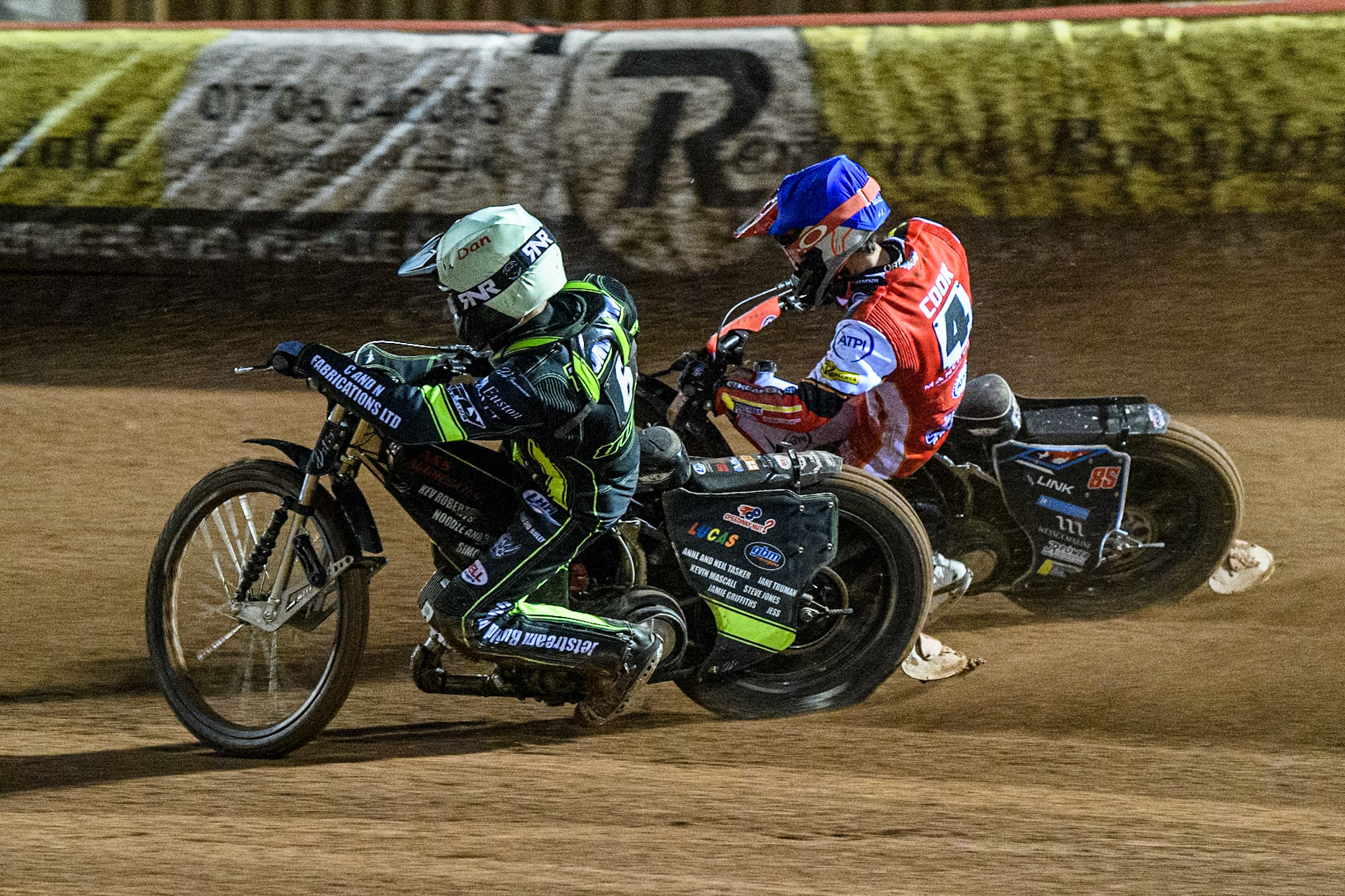 Dan Thompson of Ipswich Witches in Yellow rides inside Zach Cook of Belle Vue Aces in Blue during the Premiership Cup Quarter Final 1st Leg match between Belle Vue Aces and Ipswich Witches at the National Speedway Stadium, Manchester on Monday 24th March 2025. (Photo: Ian Charles | MI News)
