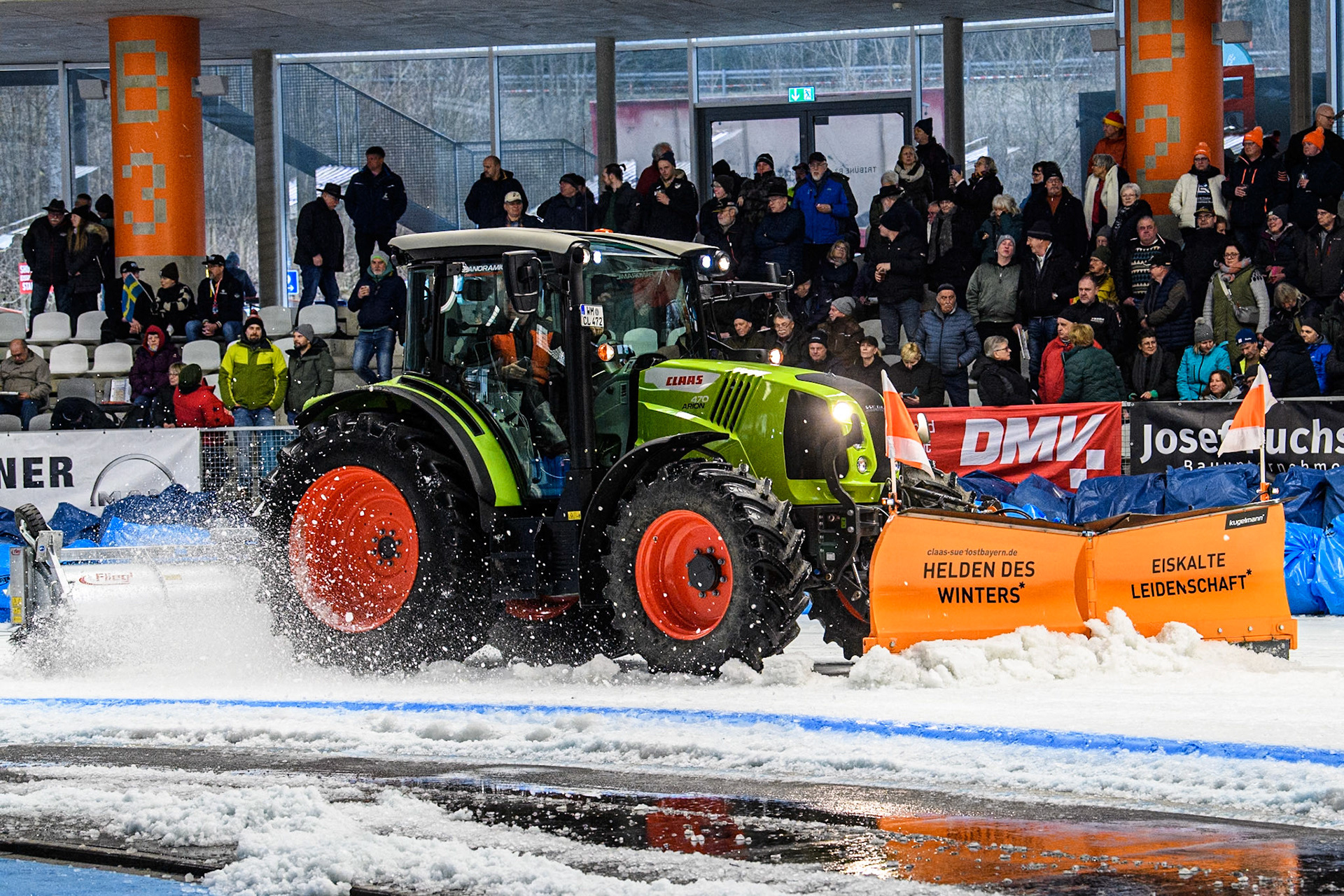 Track staff clear the snow from the track during track maintenance in the interval during the Ice Speedway Gladiators World Championship Final 2 at Max-Aicher-Arena, Inzell on Sunday 16th March 2025. (Photo: Ian Charles | MI News)