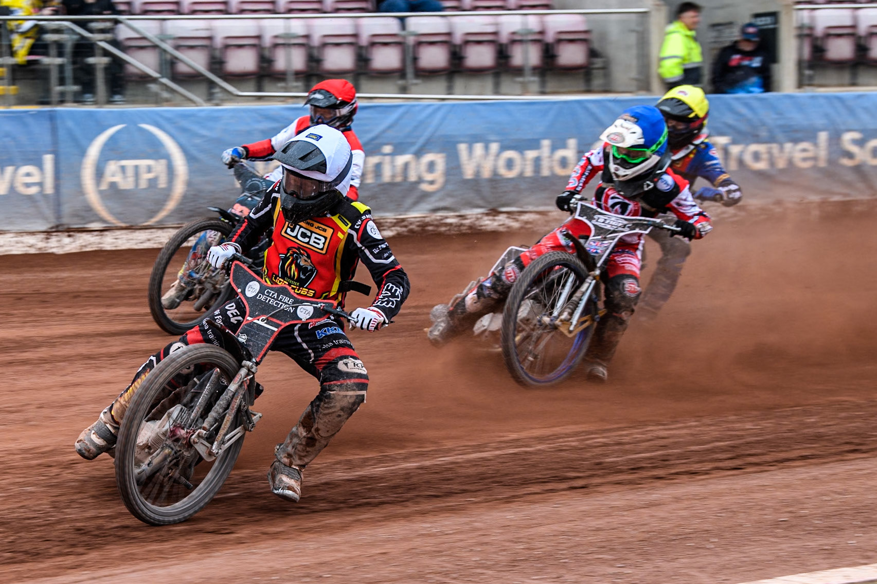 Leicester Lion Cubs' Guest Rider Ben Morley in White leading Belle Vue Colts' Jack Kingston  in Red, Belle Vue Colts' Jack Shimelt  in Blue and Leicester Lion Cubs' Eli Meadows in Yellow during the WSRA National Development League match between Belle Vue Colts and Leicester Lion Cubs at the National Speedway Stadium, Manchester on Friday 18th April 2025. (Photo: Ian Charles | MI News)
