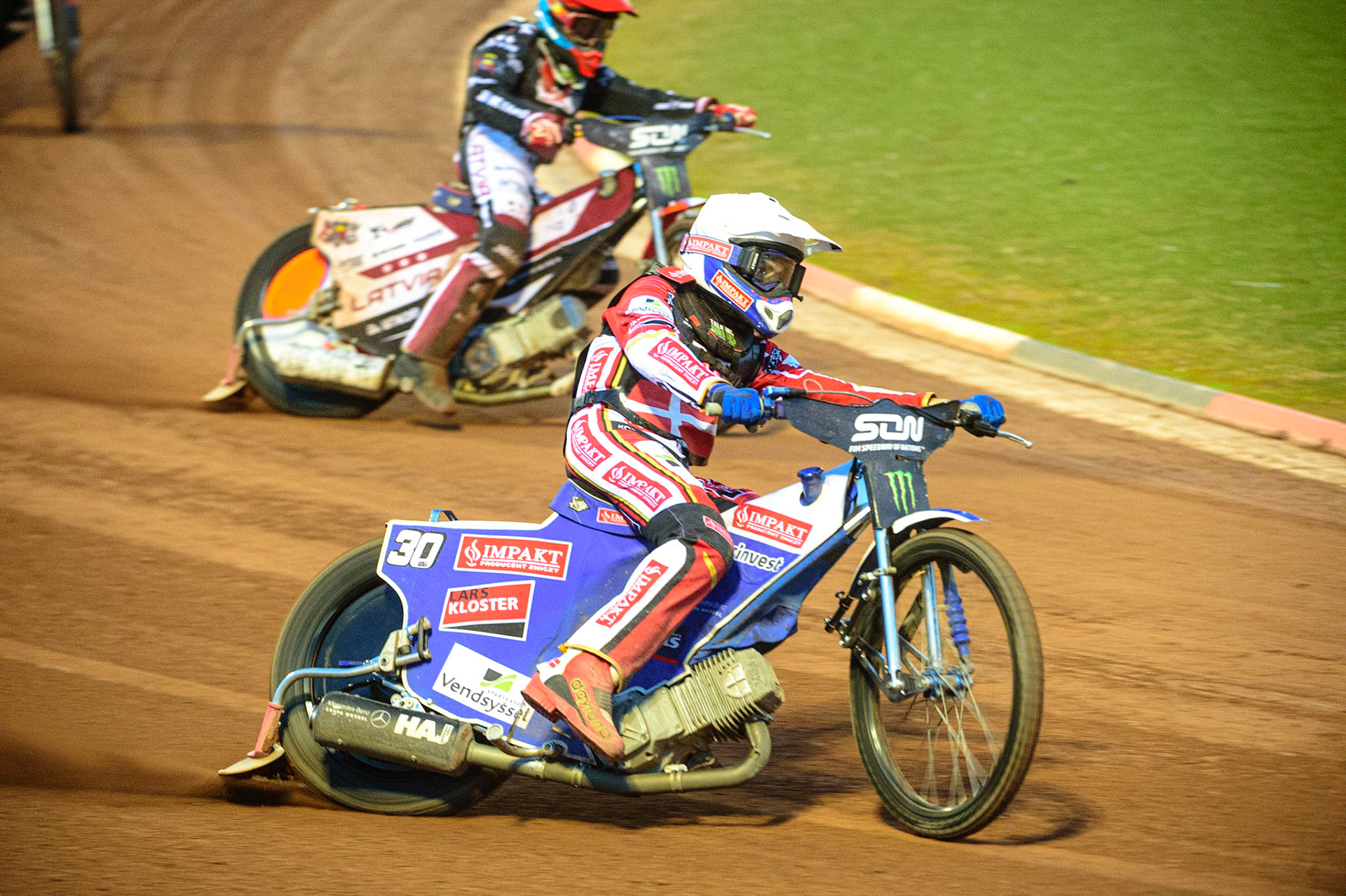 MANCHESTER, UK. OCT 16TH Leon Madsen of Denmark (White) outside Andzejs Lebedevs of Latvia (Red)during the Monster Energy FIM Speedway of Nations at the National Speedway Stadium, Manchester on Saturday  16th October 2021. (Credit: Ian Charles | MI News)