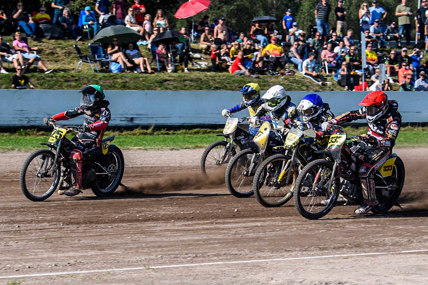 Lukas Fienhage (125) of Germany in Green  leading the pack of riders during the FIM Long Track World Championship Final 5 at the Speed Centre Roden, Roden, Netherlands on Sunday 22nd September 2024. (Photo: Ian Charles | MI News)