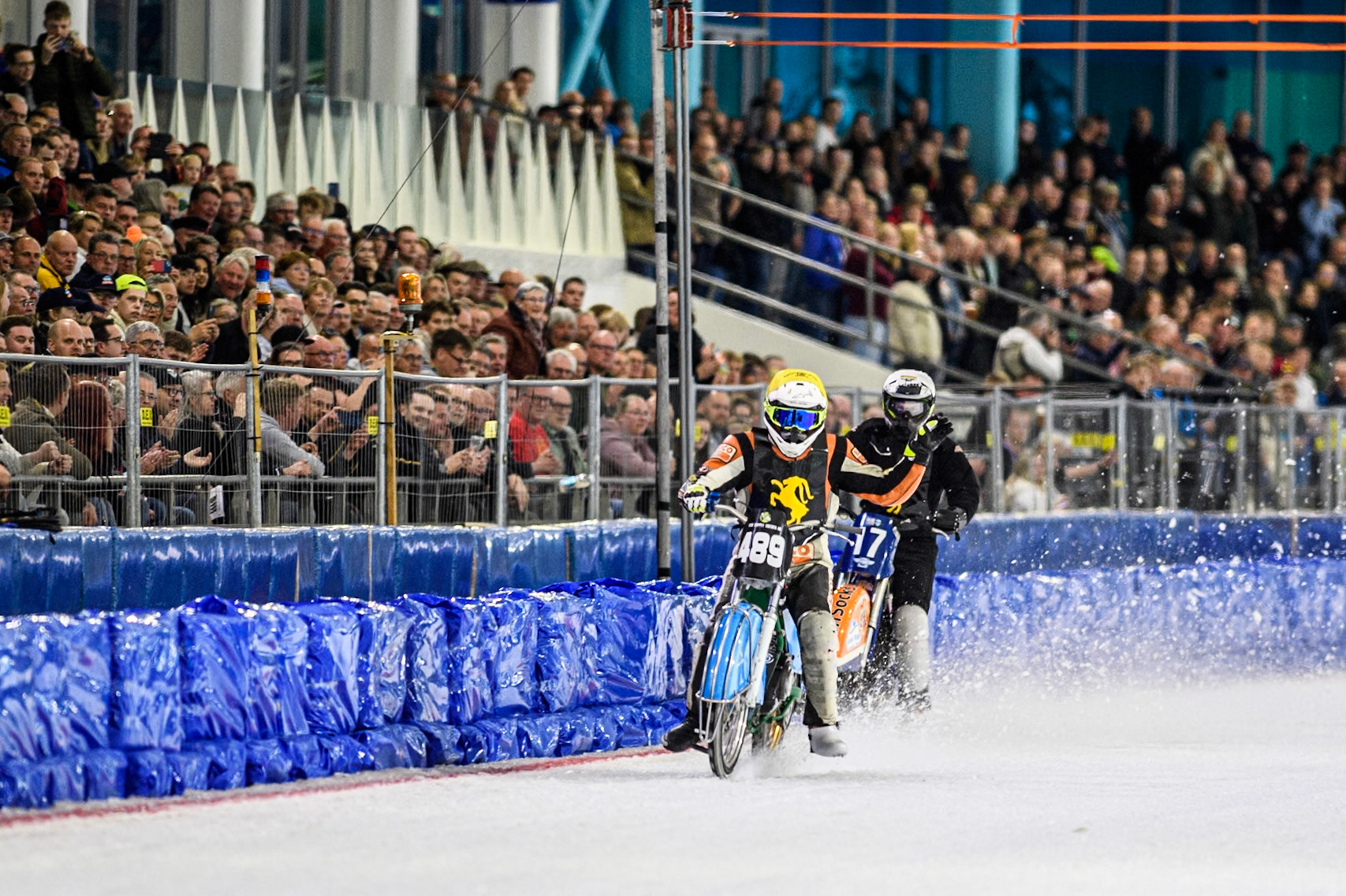 Melwin Björklin of Sweden in Yellow celebrates as he ins his first ever race in his first ever meeting ahead of Leon Kramer of The Netherlands in White during the Roelof Thijs Bokaal, Ice Rink Thialf, Heerenveen, Netherlands on Friday 4th April 2025. (Photo: Ian Charles | MI News)