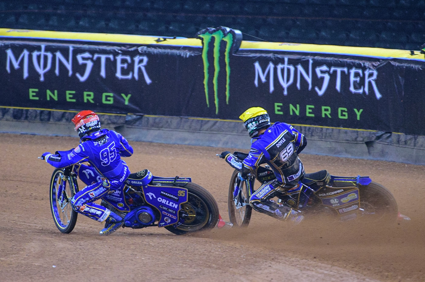 Bartosz Zmarzlik (95) (Red) leads Jason Doyle (69) (Yellow) during the FIM  Speedway Grand Prix of Great Britain at the Principality Stadium, Cardiff on Saturday 13th August 2022. (Credit: Ian Charles | MI News