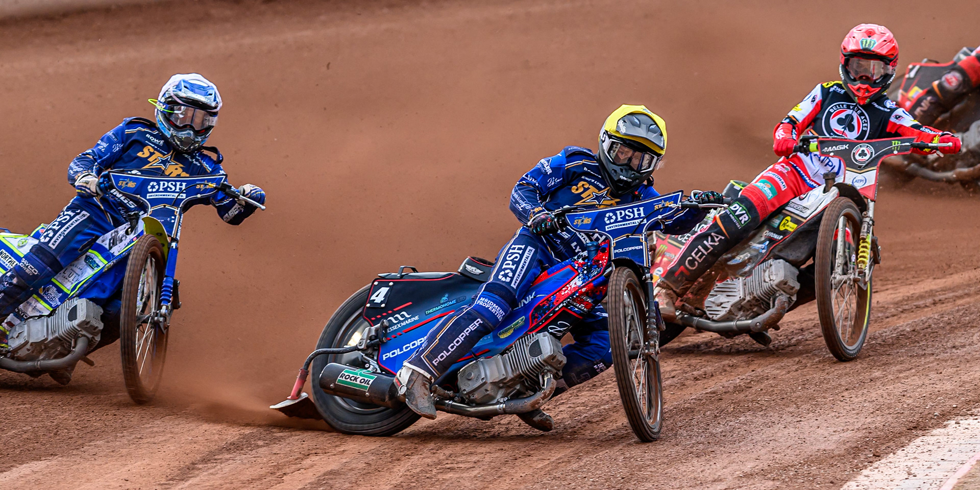 Kings Lynn Stars' Ben Cook in Yellow leading Belle Vue Aces' Jaimon Lidsey in Red during the Rowe Motor Oil Premiership match between Belle Vue Aces and King's Lynn Stars at the National Speedway Stadium, Manchester on Monday 23rd June 2025. (Photo: Ian Charles | MI News)
