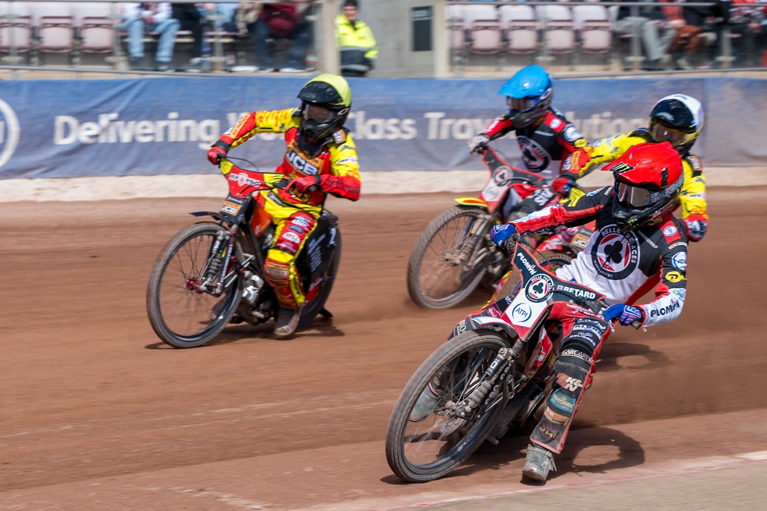 Dan Bewley  of Belle Vue Aces  in Red leading Dan Thompson of Leicester Lions  in Yellow, Tate Zischke of Belle Vue Aces  in Blue and Ryan Douglas of Leicester Lions  in White during the Knockout Cup Northern Section match between Belle Vue Aces and Leicester Lions at the National Speedway Stadium, Manchester on Monday 6th April 2026. (Photo: Ian Charles | MI News)