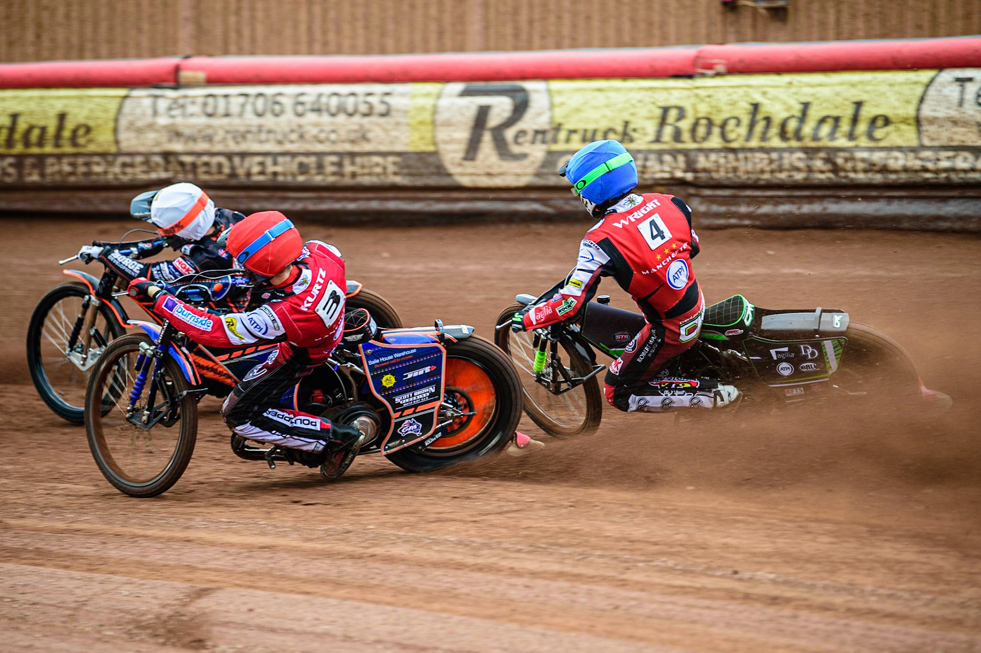 Charles Wright (Blue) and Brady Kurtz  (Red) chase Luke Becker (White) during the SGB Premiership match between Belle Vue Aces and Wolverhampton Wolves at the National Speedway Stadium, Manchester on Monday 29th August 2022. (Credit: Ian Charles | MI News)