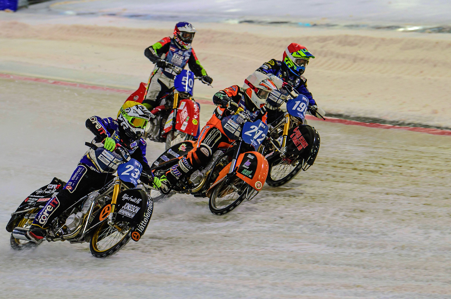 HEERENVEEN, NL. The Grand Final: Martin Hååruhiltunen (199)  (Red) inside Lukas Hutla (212) (White) and Jimmy Hörrnell (237)  (Yellow) with Harald Simon (50) (Blue) behind  during the FIM Ice Speedway Gladiators World Championship Final 4 at Ice Rink Thialf, Heerenveen on Sunday  3 April 2022. (Credit: Ian Charles | MI News)