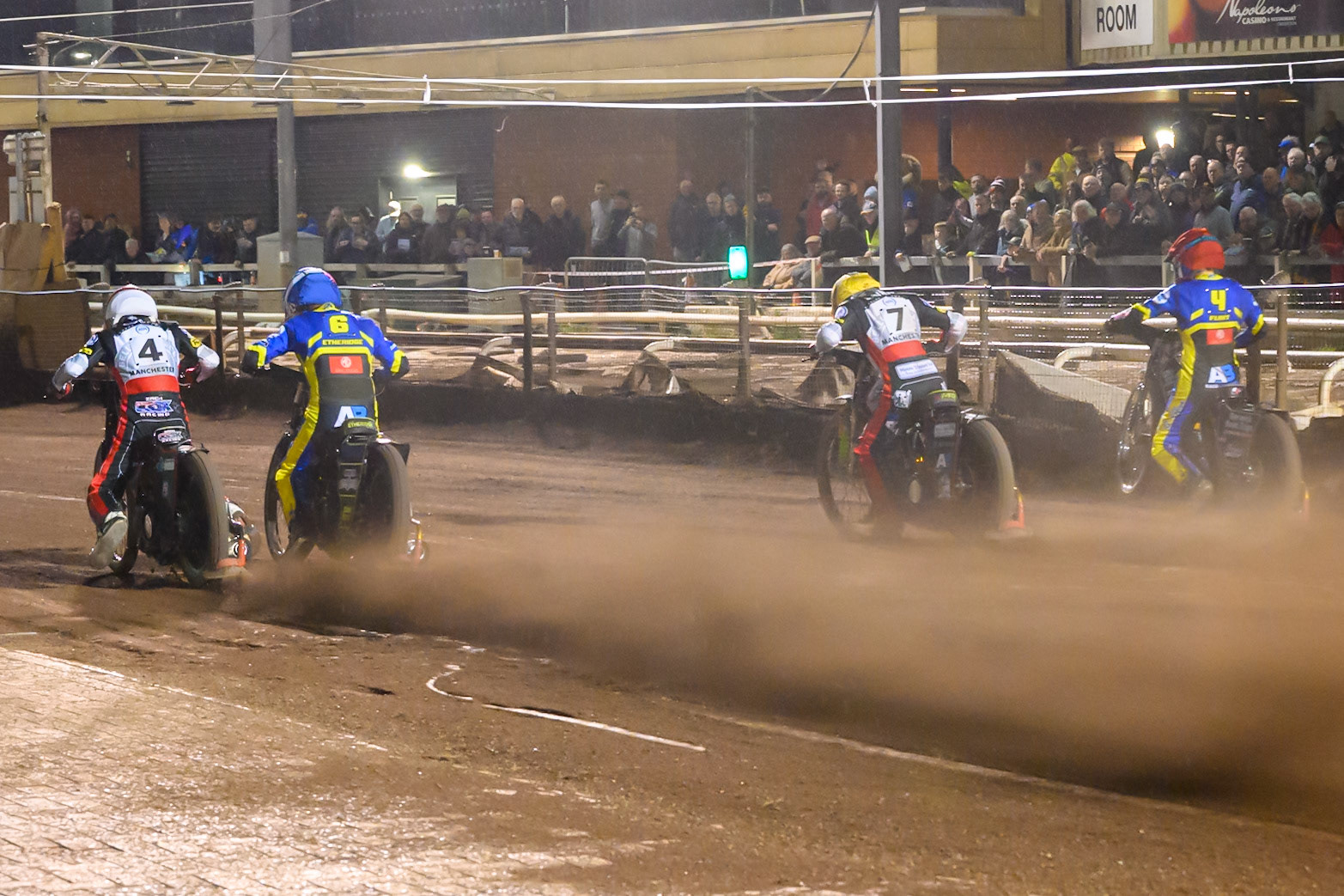 Heat 14 start: (L to R) Zach Cook of Belle Vue Aces  in White, Jye Etheridge of Sheffield Tigers   in Blue, William Cairns of Belle Vue Aces in Yellow and Leon Flint of Sheffield Tigers   in White during the Knockout Cup Northern Section match between Sheffield Tigers and Belle Vue Aces at Owlerton Stadium, Sheffield on Thursday 2nd April 2026. (Photo: Ian Charles | MI News)