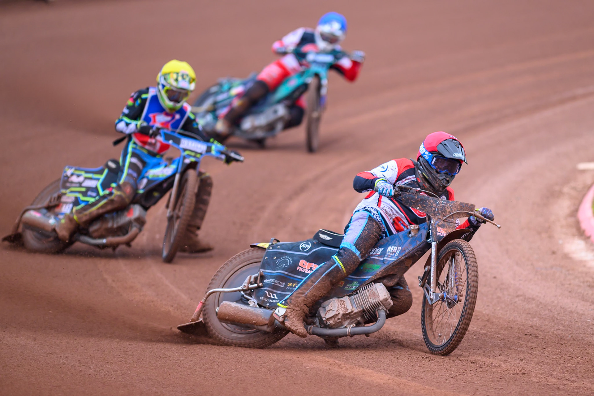 Belle Vue Colts' Jack Kingston in Red leading Steelers' Guest Rider Senna Summers  in Yellow and Belle Vue Colts' Mason Watson in Blue during the WSRA National Development League match between Belle Vue Colts and Sheffield/Scunthorpe Steelers at the National Speedway Stadium, Manchester on Sunday 12th October 2025. (Photo: Ian Charles | MI News)