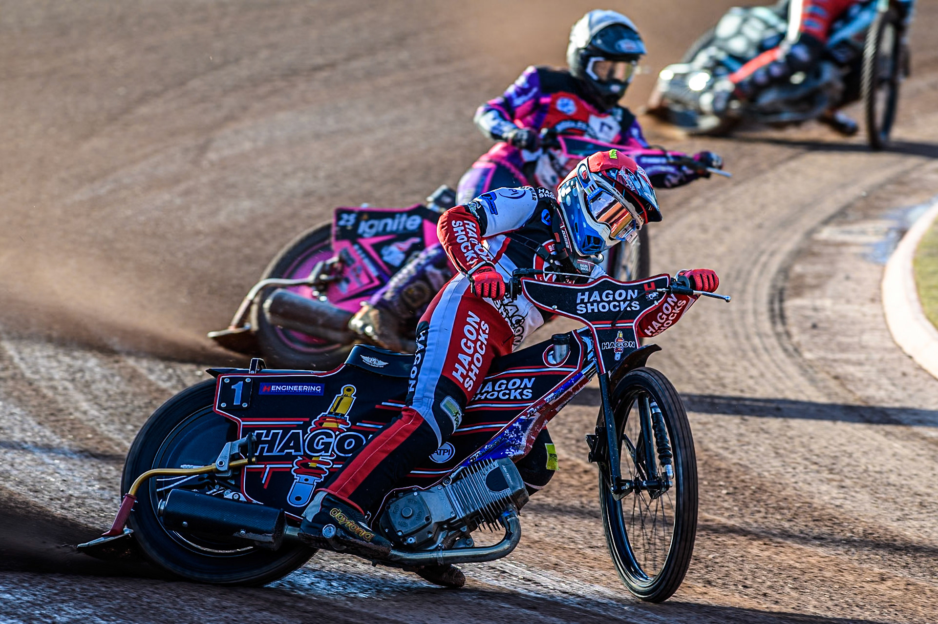 Belle Vue Colts' Sam Hagon in Red leading Middlesbrough Tigers' Ben Trigger in White during the WSRA National Development League match between Belle Vue Colts and Middlesbrough Tigers at the National Speedway Stadium, Manchester on Monday 17th June 2024. (Photo: Ian Charles | MI News)