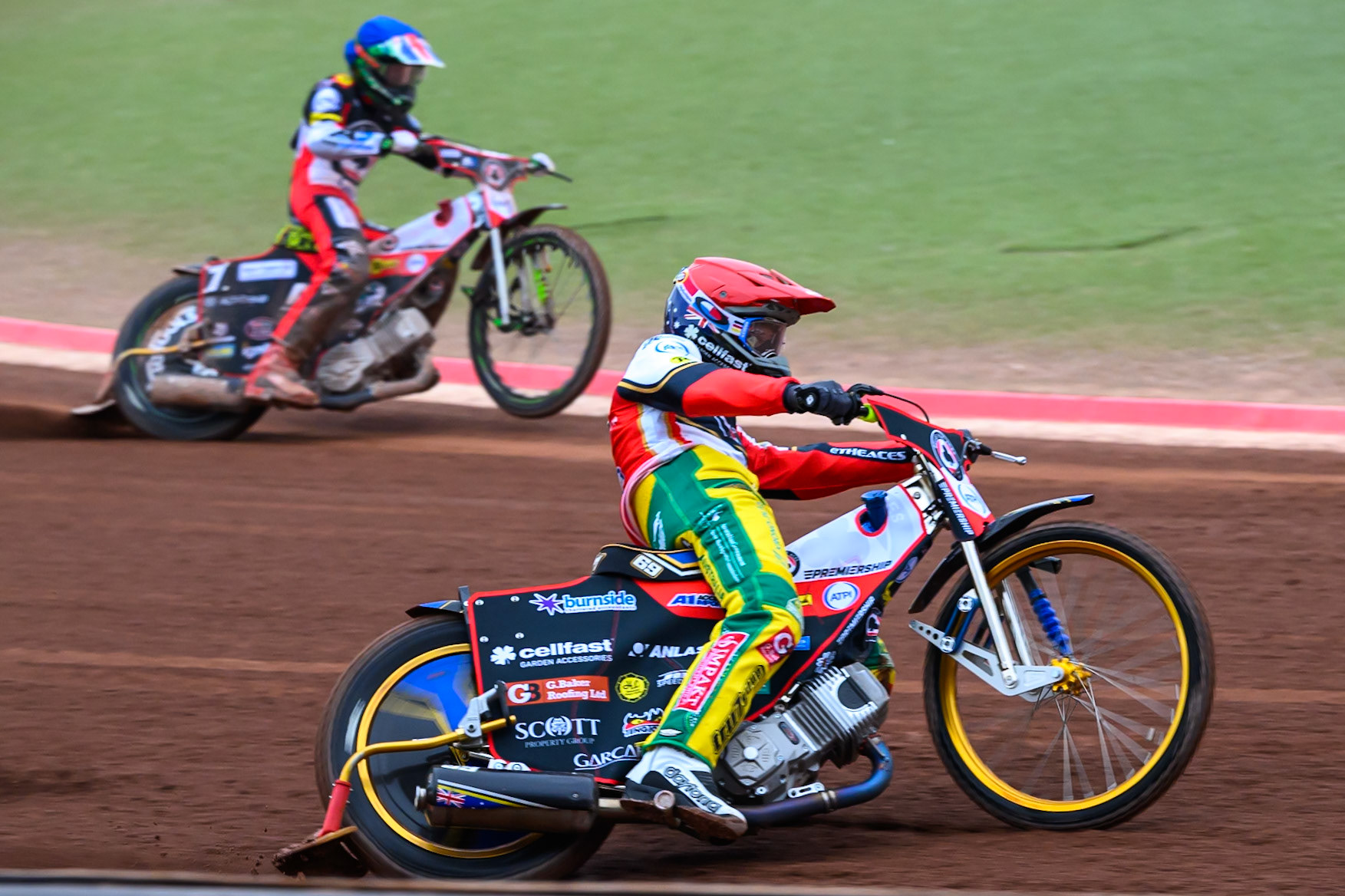 Jason Doyle of Belle Vue Aces in Red rides outside William Cairns of Belle Vue Aces in Blue during the Rowe Motor Oil Premiership match between Belle Vue Aces and Leicester Lions at the National Speedway Stadium, Manchester on Monday 15th June 2026. (Photo: Ian Charles | MI News)