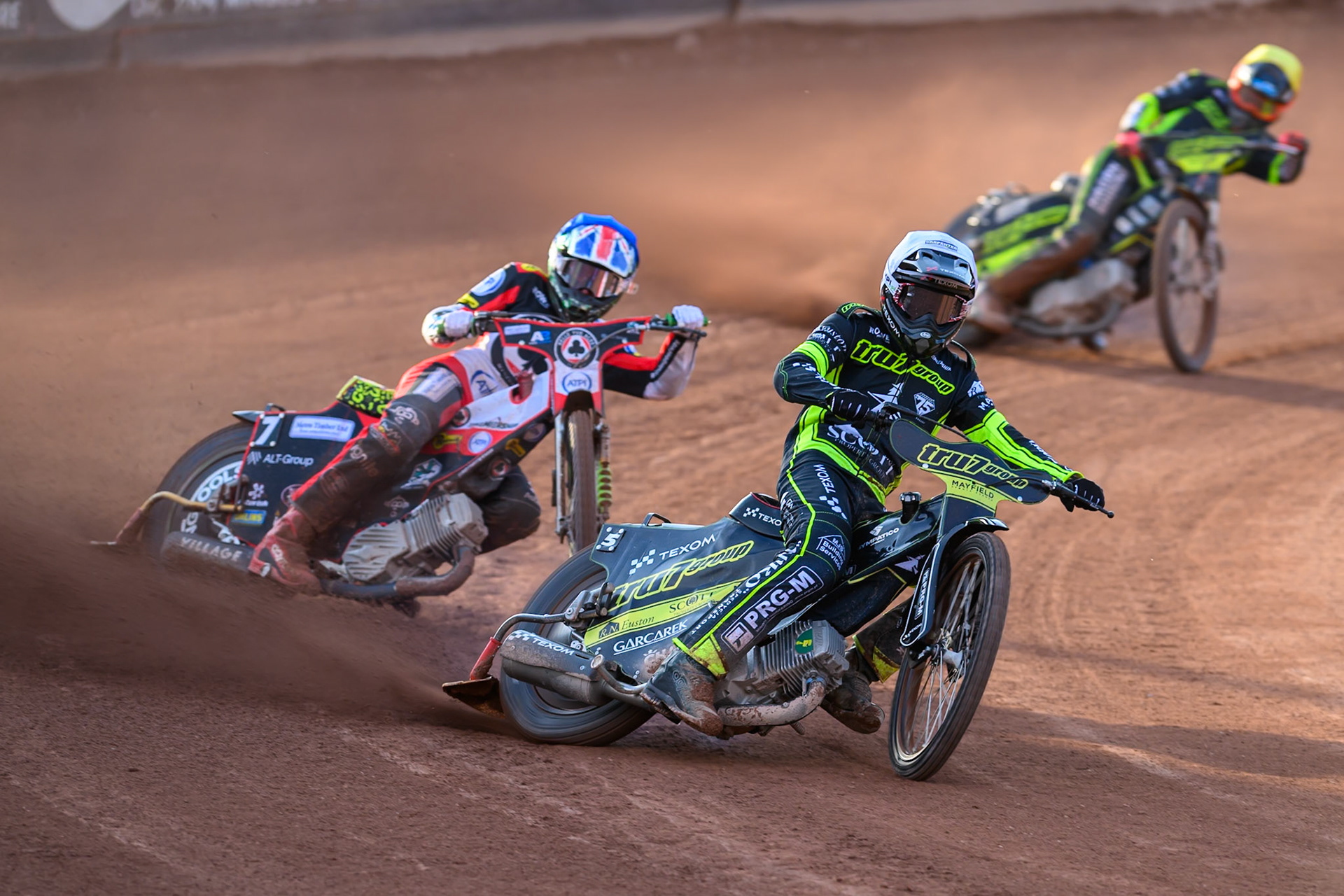 Tobiasz Musielak of Ipswich Witches in White leading William Cairns of Belle Vue Aces in Blue and Jason Edwards of Ipswich Witches in Yellow during the Rowe Motor Oil Premiership match between Belle Vue Aces and Ipswich Witches at the National Speedway Stadium, Manchester on Saturday 20th June 2026. (Photo: Ian Charles | MI News)