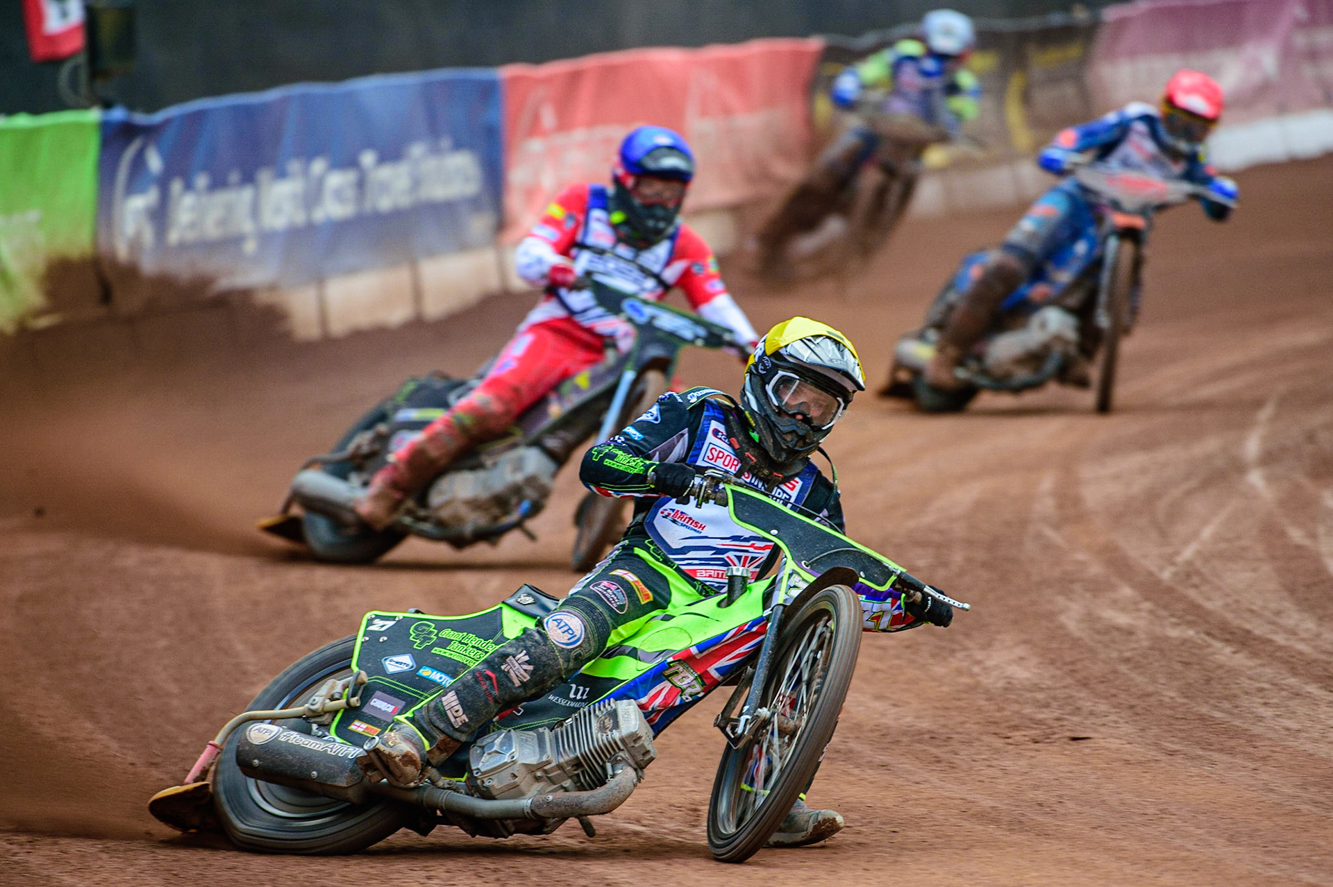 Tom Brennan  (Yellow) leads Craig Cook  (Blue) Steve Worrall  (Red) and Richie Worrall  (White) during the Sports Insure British Speedway Final, at the National Speedway Stadium, Manchester, on Sunday 18th September 2022. (Credit: Ian Charles | MI News )