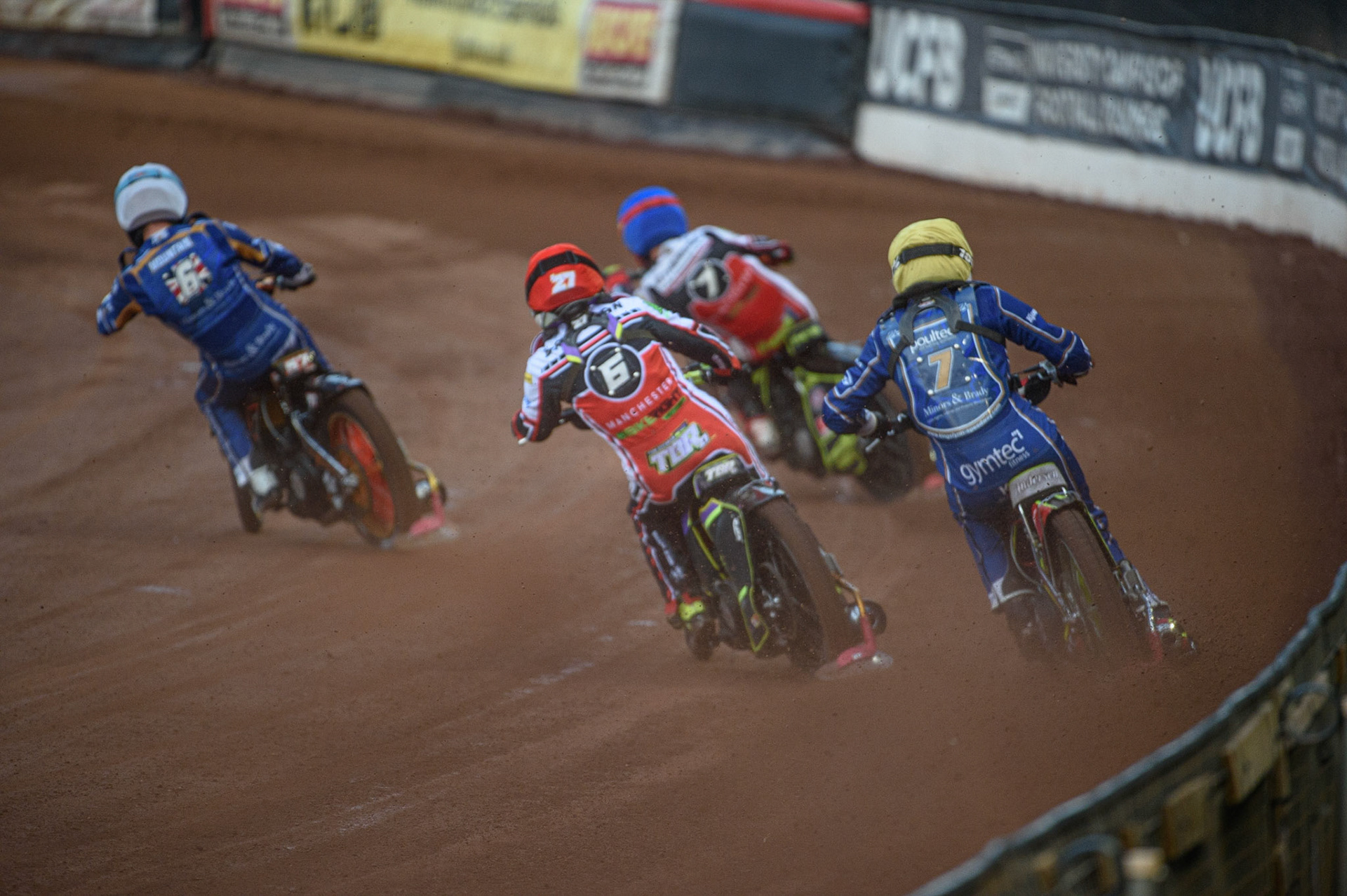 MANCHESTER, UK. AUGUST 23RD    Kasper Andersen  (Yellow) chases Tom Brennan  (Red), Connor Mountain  (White) and Jye Etheridge  (Blue) during the SGB Premiership match between Belle Vue Aces and King's Lynn Stars at the National Speedway Stadium, Manchester on Monday 23rd August 2021. (Credit: Ian Charles | MI News)