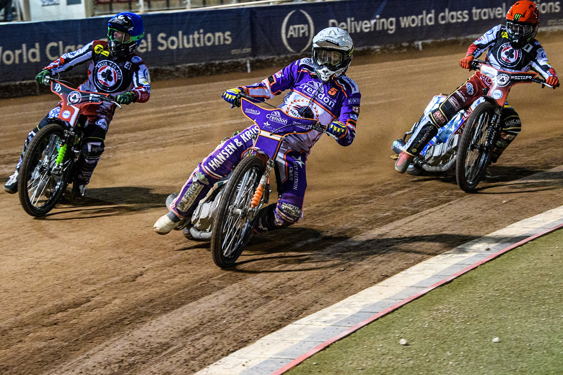 Niels-Kristian Iversen  (White) leads Charles Wright  (Blue) and Dan Bewley  (Red) during the SGB Premiership match between Belle Vue Aces and Peterborough at the National Speedway Stadium, Manchester on Monday 24th April 2023. (Photo: Ian Charles | MI News)