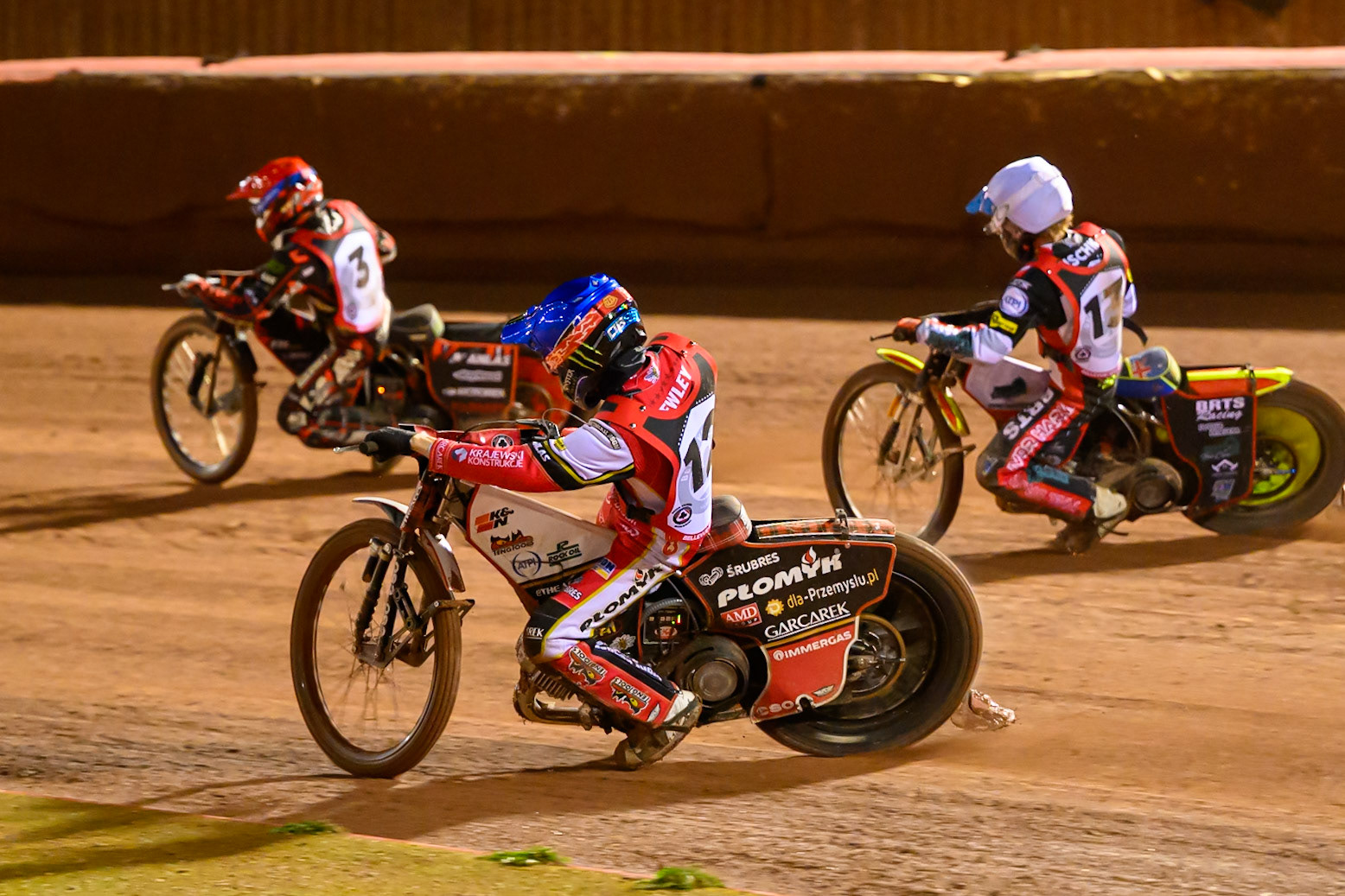 Dan Bewley  in Blue rides inside Reserve Rider Will Cairns in White and Jan Kvech in Red during the Peter Craven Memorial Trophy at the National Speedway Stadium, Manchester, on Monday 16th March 2026. (Photo: Ian Charles | MI News)