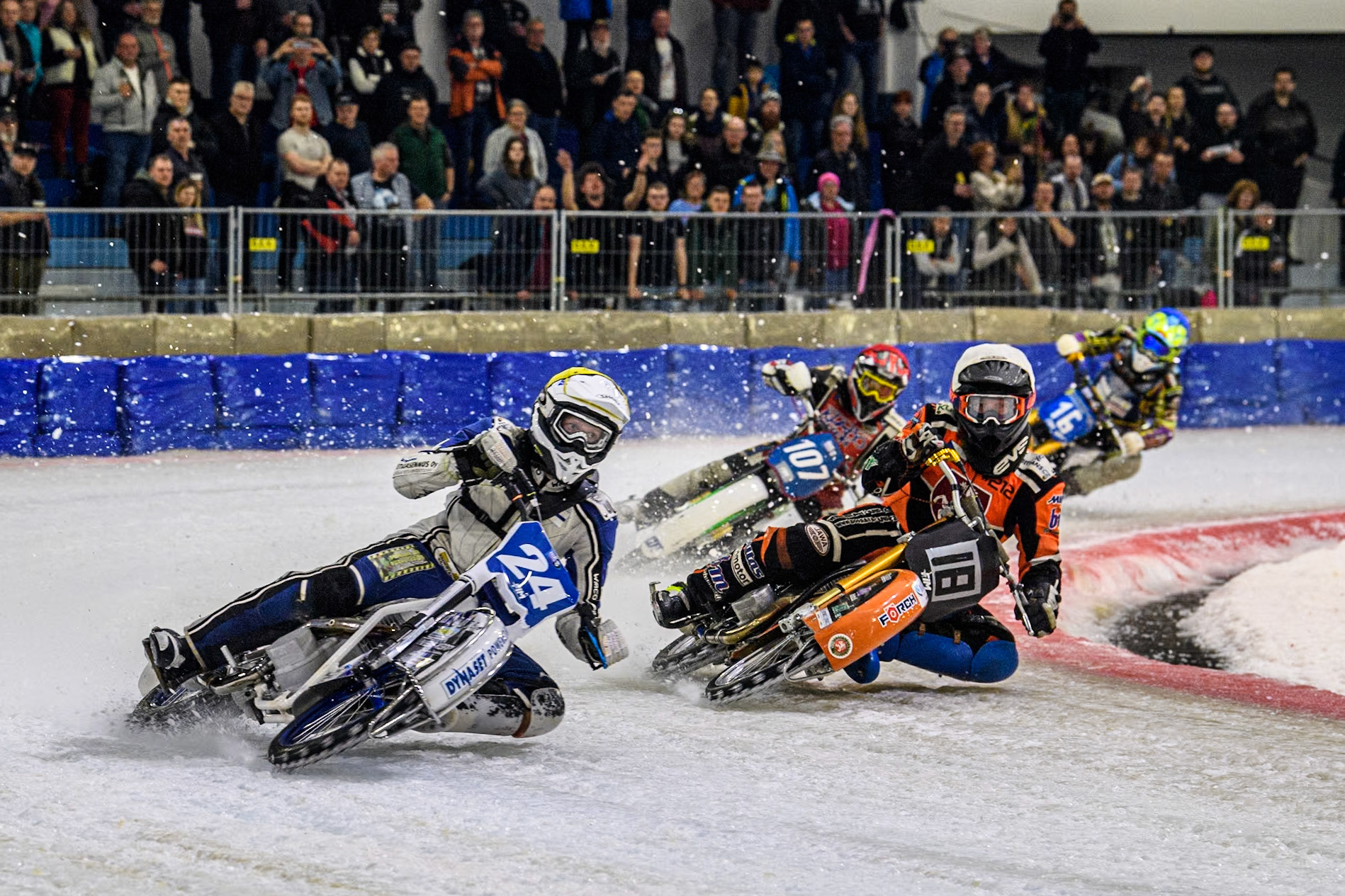 Finland's Max Koivula (24) \in Yellow leading Reserve Czech Republic's Lukáš Hutla (18) in White Czech Republic's Andrej Diviš (107) in Red and Germany's Maximillian Neidermaier (16) in Blue during the FIM Ice Speedway Gladiators World Championship Final 3 at Ice Rink Thialf, Heerenveen on Saturday 6th April 2024. (Photo: Ian Charles | MI News)