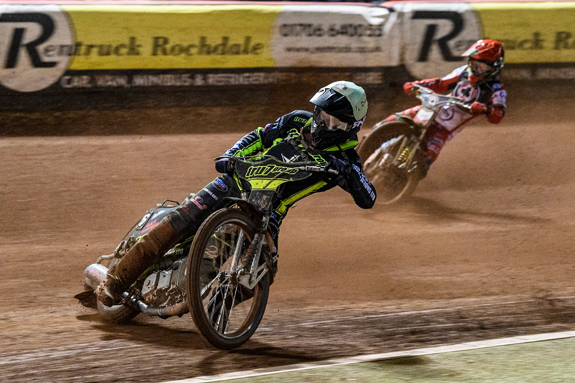 Dan Thompson of Ipswich Witches in Yellow leading Jaimon Lidsey of Belle Vue Aces in Red during the Premiership Cup Quarter Final 1st Leg match between Belle Vue Aces and Ipswich Witches at the National Speedway Stadium, Manchester on Monday 24th March 2025. (Photo: Ian Charles | MI News)