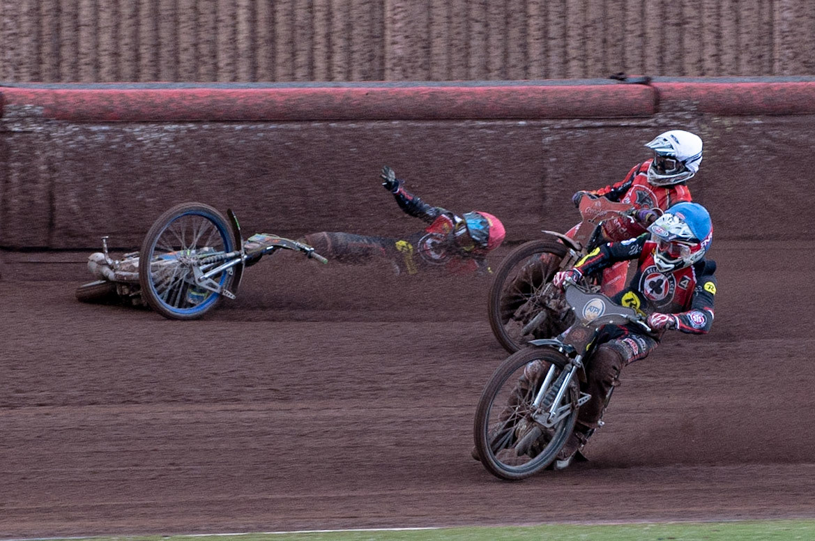 Photo by Ian Charles:

Dan Bewley  (Red) falls after clashing with Rohan Tungate (White) with Steve Worrall  leading

Belle Vue Aces v Peterborough Panthers, British Speedway Premiership, National Speedway Stadium, Manchester, Thursday, 13, June, 2019