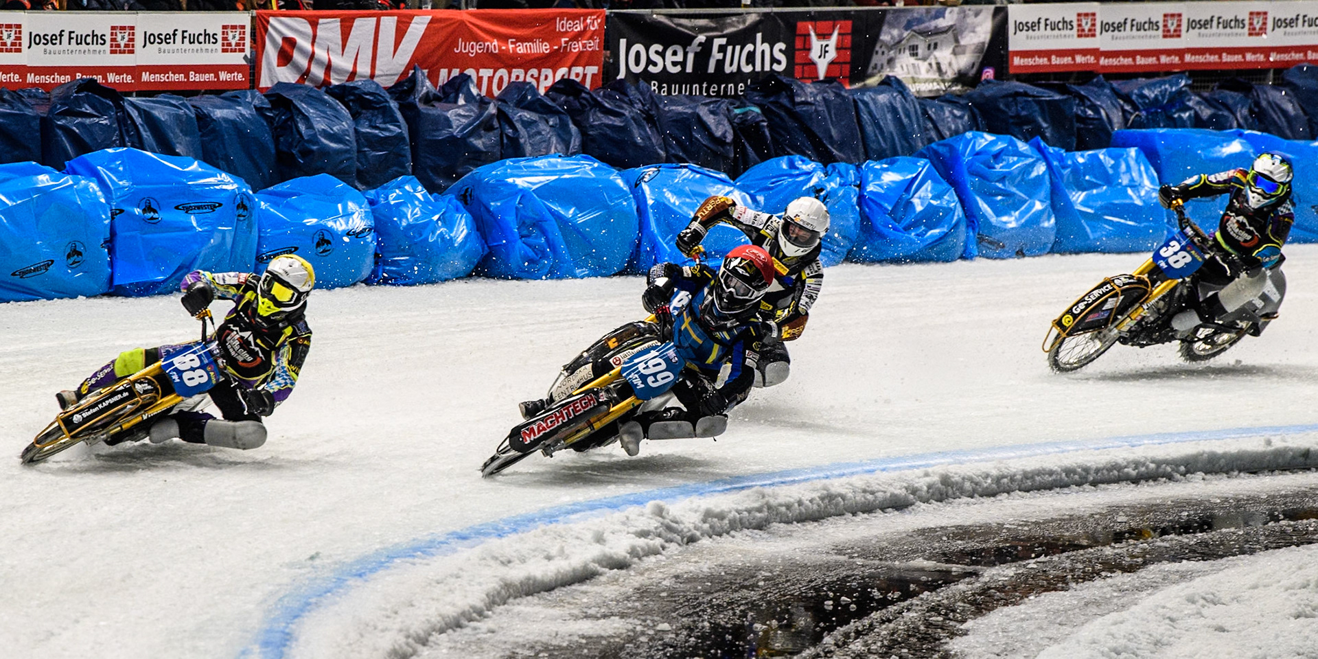 Max Niedermaier  (88) of Germany in Yellow leading Martin Haarahiltunen (199) of Sweden in Red Heikki Huusko (67) of Finland in Yellow and Maximilian Niedermaier (38) of Germany in Blue during the Ice Speedway Gladiators World Championship Final 1 at Max-Aicher-Arena, Inzell on Saturday 15th March 2025. (Photo: Ian Charles | MI News)