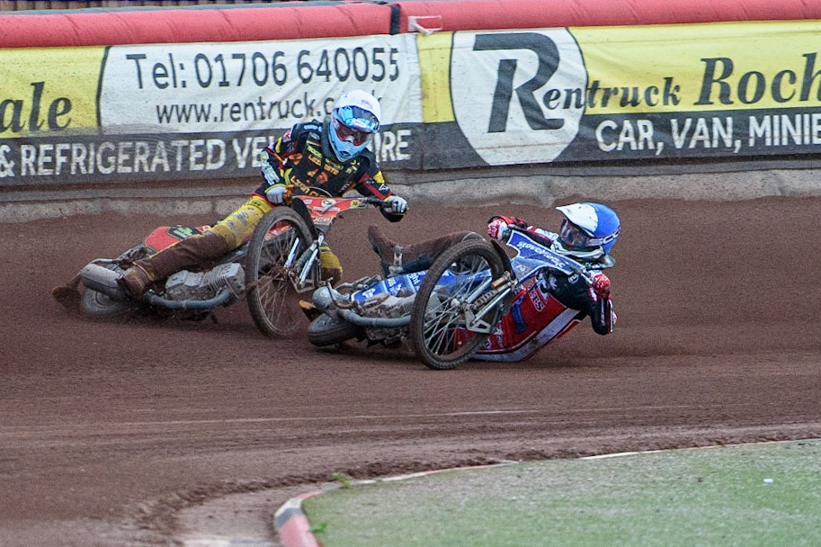 MANCHESTER, UK. JULY 29TH   Harry McGurk (Blue) picks up some drive and falls during the National Development League match between Belle Vue Colts and Leicester Lion Cubs at the National Speedway Stadium, Manchester on Thursday 29th July 2021. (Credit: Ian Charles | MI News)