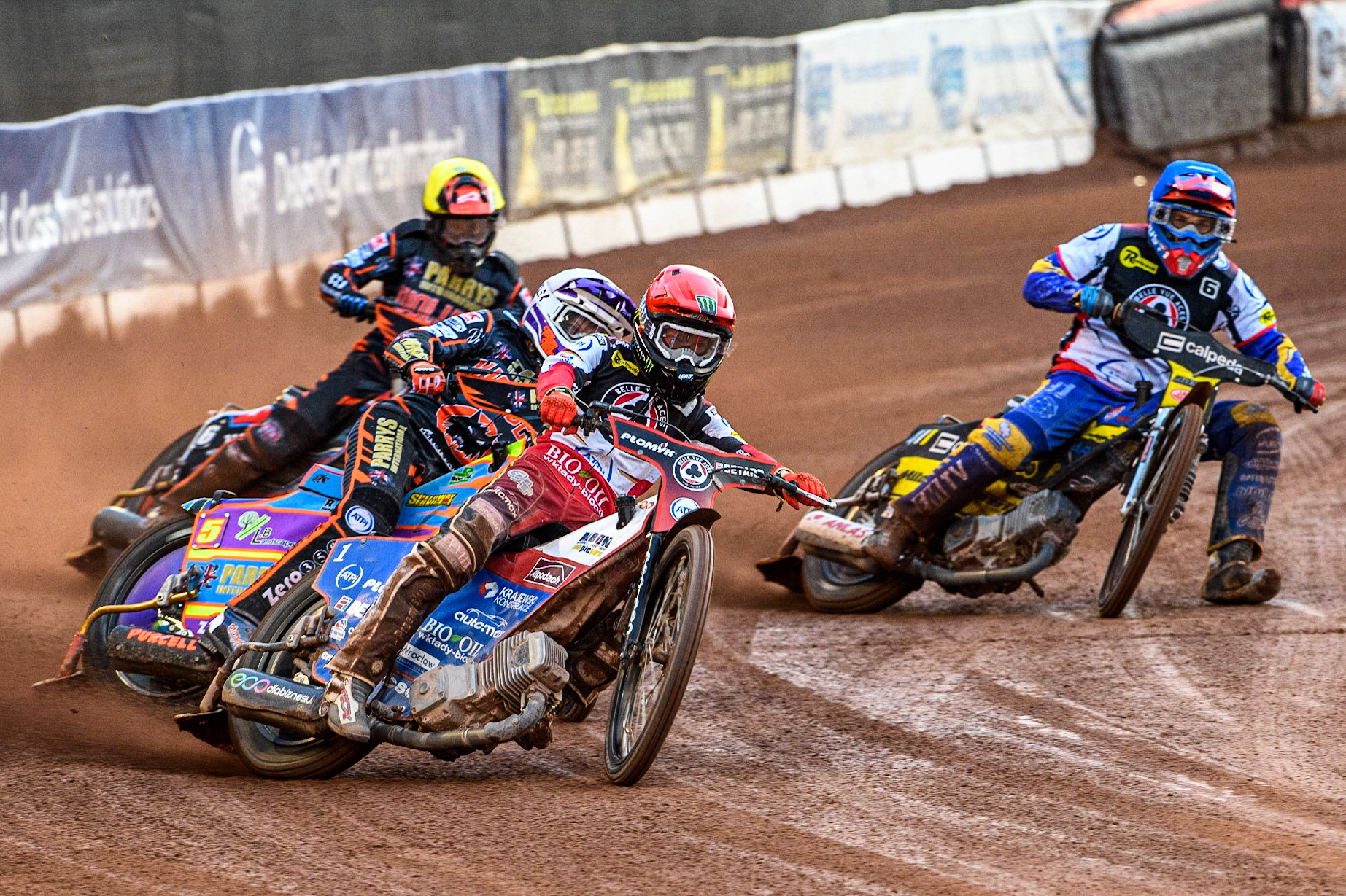 Dan Bewley (Red) leads Rory Schlein (White) Paco Castagna (Blue) and Zach Cook (Yellow) during the Sports Insure Premiership Knock Out Cup Quarter Final 2nd Leg between Belle Vue Aces and Wolverhampton Wolves at the National Speedway Stadium, Manchester on Thursday 18th May 2023. (Photo: Ian Charles | MI News)