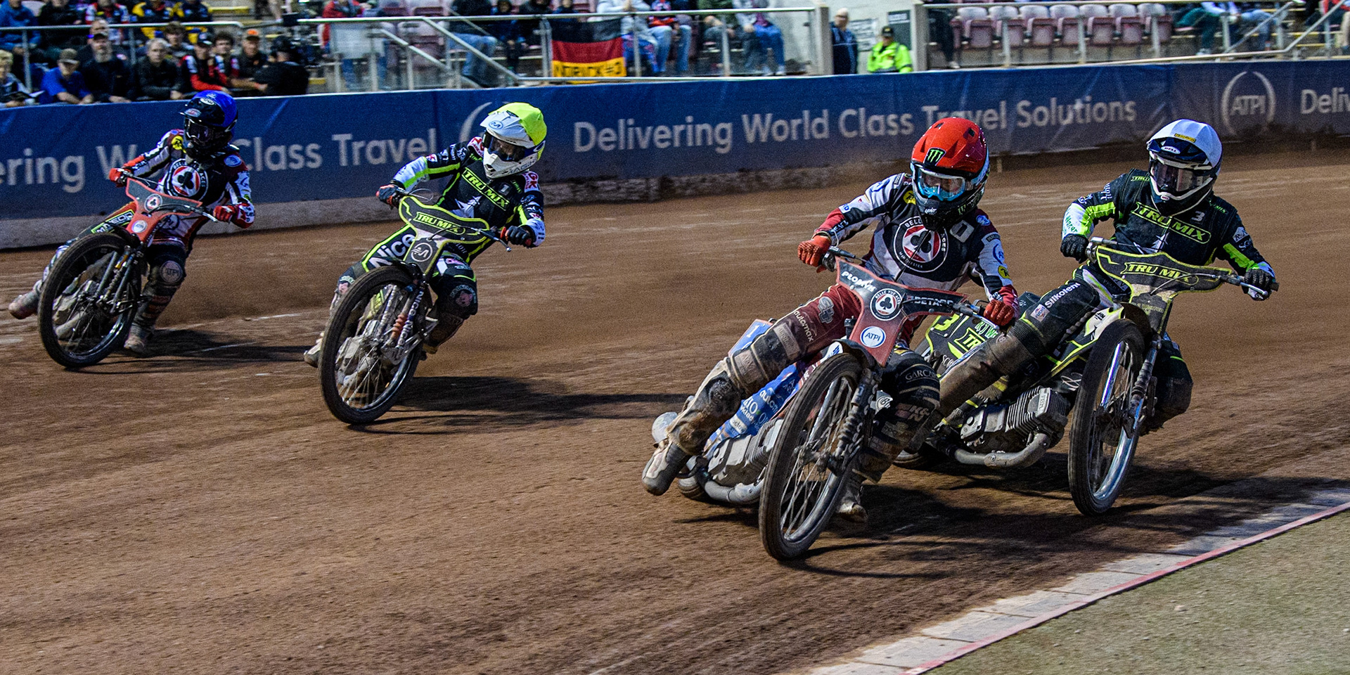 Dan Bewley (Red) leads Danny King (White), Emil Sayfutdinov (Yellow) and Tom Brennan (Blue) during the Sports Insure Premiership match between Belle Vue Aces and Ipswich Witches at the National Speedway Stadium, Manchester on Monday 17th July 2023. (Photo: Ian Charles | MI News)