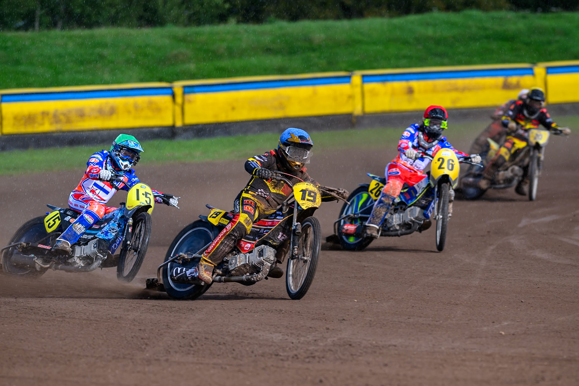 Lukas Fienhage (19) of Germany in Blue leading Dave Meijerink (15) of Netherlands in Green , William Kruit (26) of Netherlands in Red and Timo Wachs (20) of Germany in Yellow during the FIM Long Track of Nations 2026 at the Speed Centre Roden in the Netherlands on Sunday 20th September 2026. (Photo: Ian Charles | MI News)