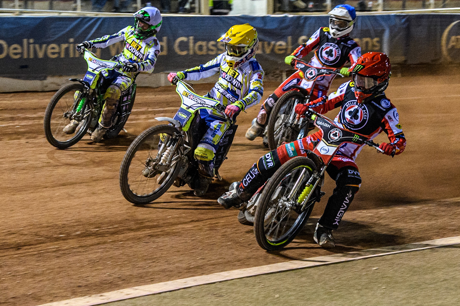 Belle Vue Aces' Jaimon Lidsey in Red rides inside Oxford Spires' Maciej Janowski in Yellow, Oxford Spires' Charles Wright in White with Belle Vue Aces' Jake Mulford in Blue behind during the Rowe Motor Oil Premiership match between Belle Vue Aces and Oxford Spires at the National Speedway Stadium, Manchester on Monday 14th April 2025. (Photo: Ian Charles | MI News)