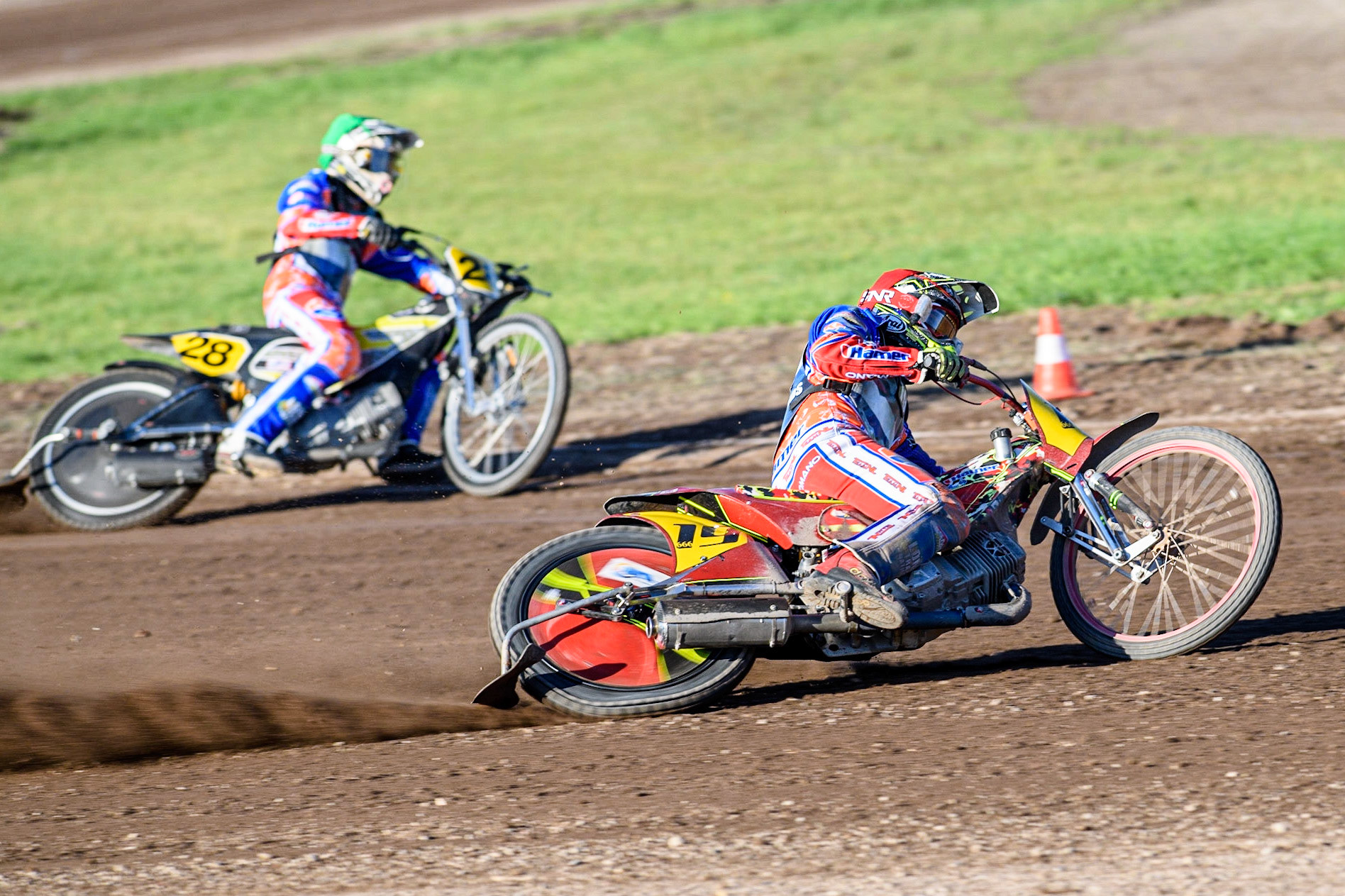 Romano Hummel (Red) outside team mate Mika Meijer (Green) during the FIM Long Track Of Nations event at the Speed Centre Roden on Sunday 24th September 2023. (Photo: Ian Charles | MI News)