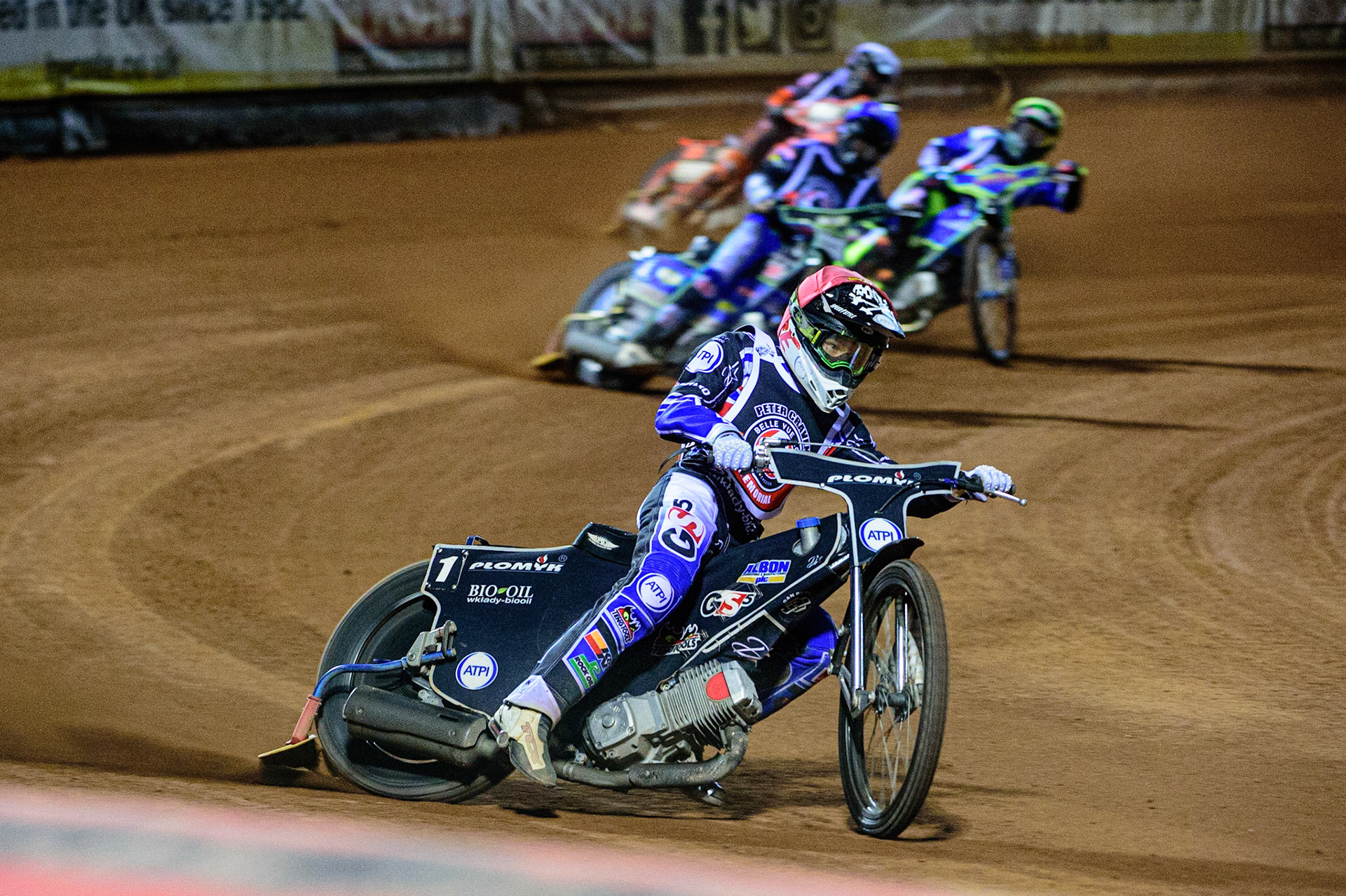 MANCHESTER, UK. OCT 23RD  Dan Bewley (Red) has a huge lead over the other three riders in heat 11 during the Peter Craven Memorial Trophy event at the National Speedway Stadium, Manchester on Saturday 23rd October 2021. (Credit: Ian Charles | MI News)