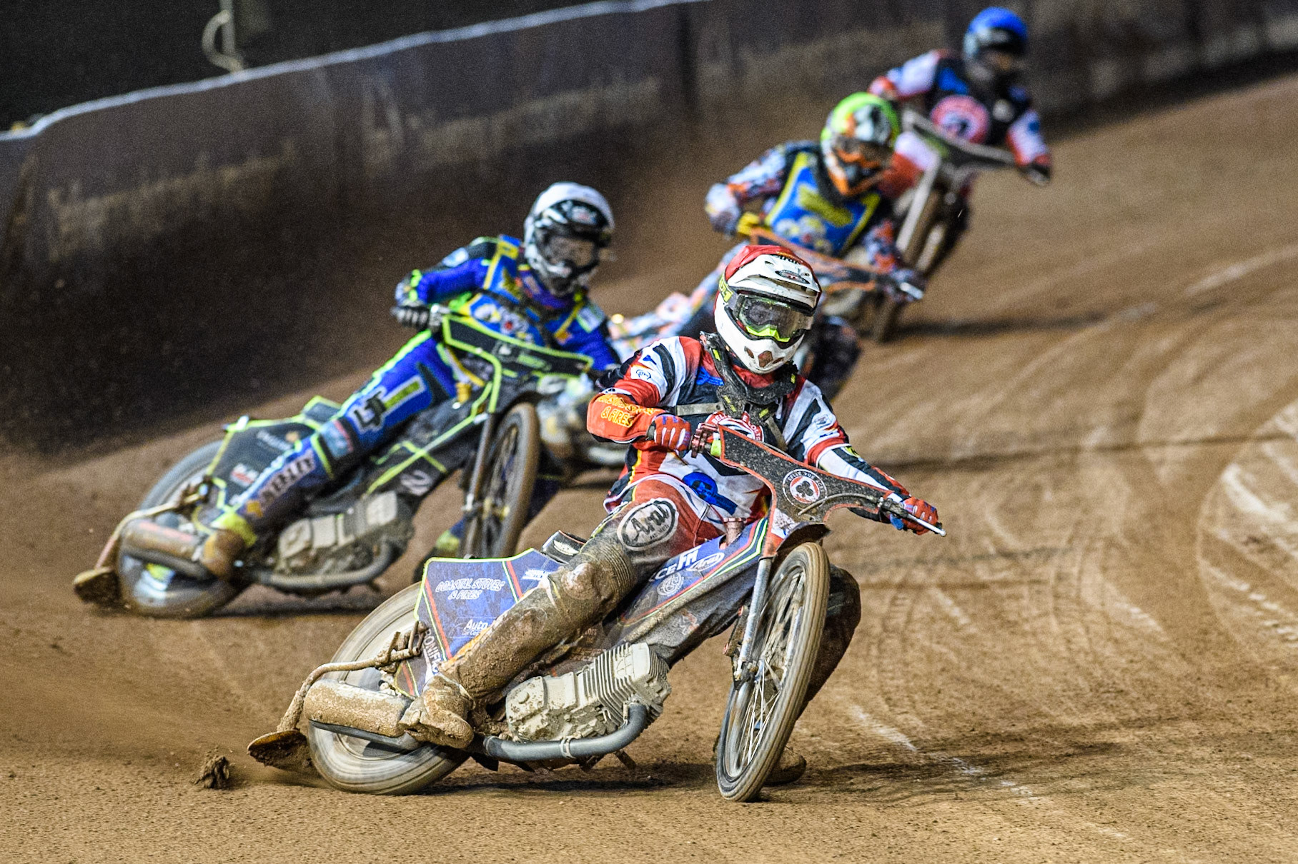 Belle Vue Colts' Guest Rider Jake Mulford in Red leading Sheffield Cubs' Nathan Ablitt in White, Sheffield Cubs' Mickie Simpson in Yellow and Belle Vue Colts' Matt Marson in Blue during the WSRA National Development League match between Belle Vue Colts and Sheffield Tiger Cubs at the National Speedway Stadium, Manchester on Monday 7th October 2024. (Photo: Ian Charles | MI News)
