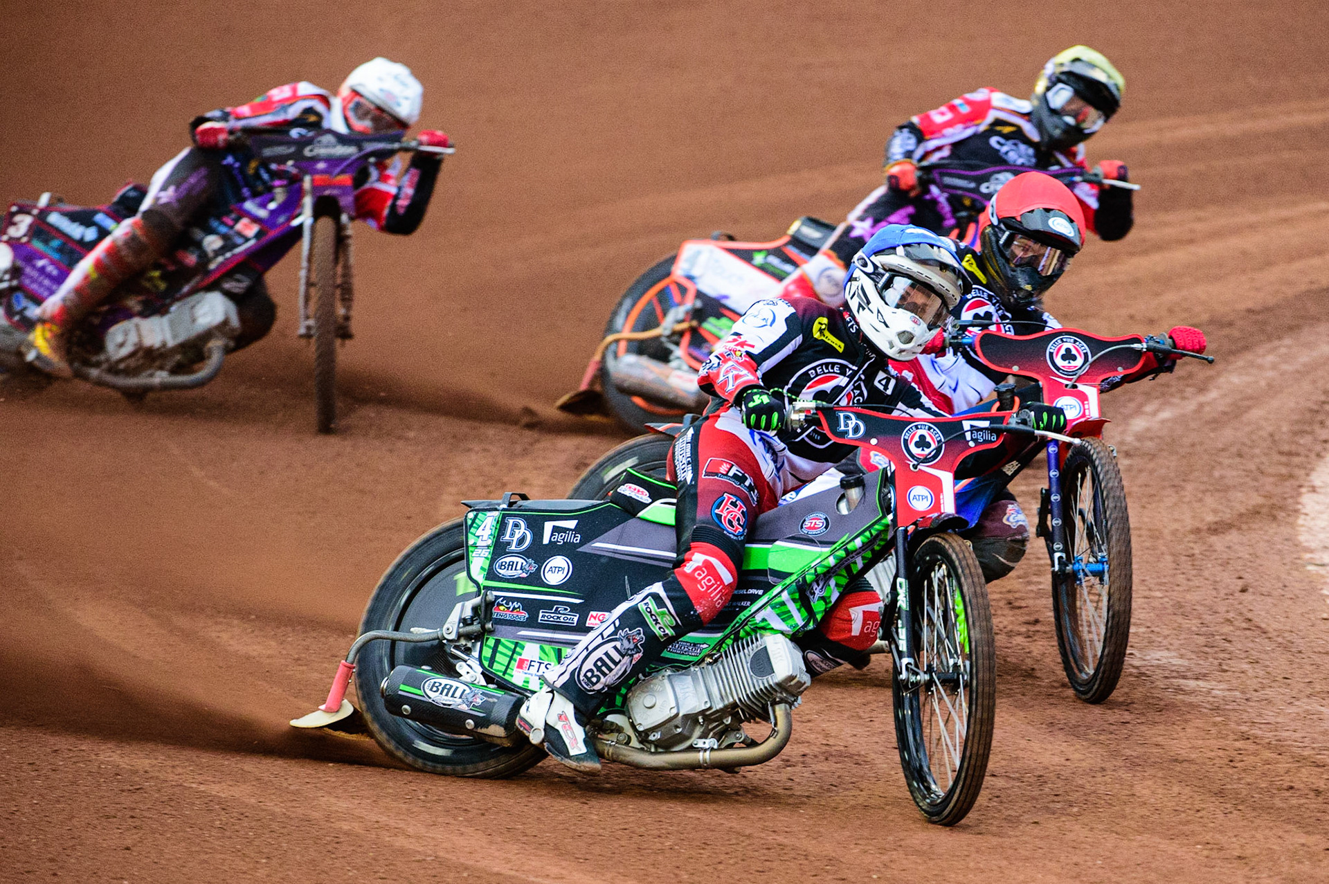 Charles Wright (Blue) leads team mate Brady Kurtz (Red) lead Scott Nicholls  (Yellow) and Ulrich Oostergaard  (White) during the SGB Premiership match between Belle Vue Aces and Peterborough at the National Speedway Stadium, Manchester on Monday 25th July 2022. (Credit: Ian Charles | MI News