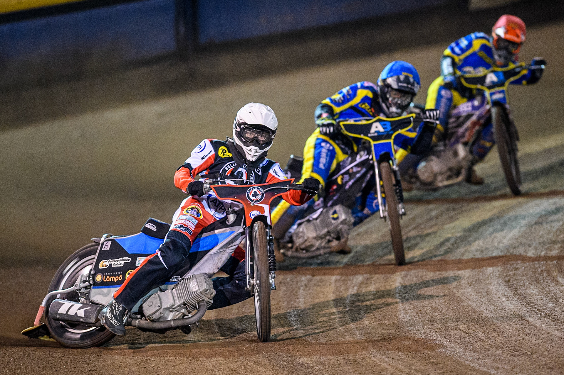Belle Vue Aces' Antti Vuolas  in White leading Sheffield Tigers' Dan Gilkes  in Blue and Sheffield Tigers' Jason Edwards  in Red during the Rowe Motor Oil Premiership Play Off Semi Final 2nd leg between Sheffield Tigers and Belle Vue Aces at Owlerton Stadium, Sheffield on Thursday 19th September 2024. (Photo: Ian Charles | MI News)