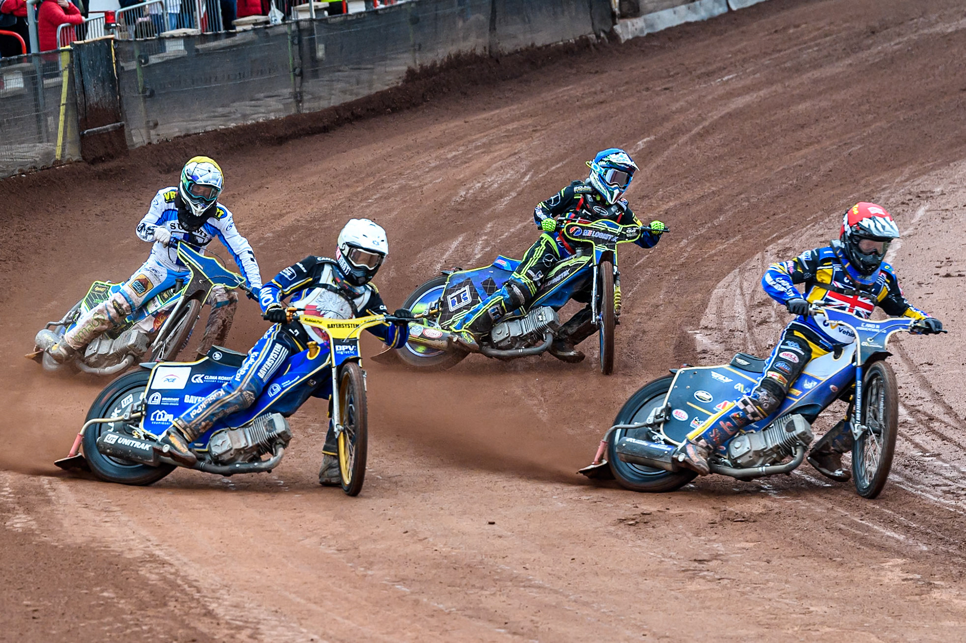Joe Thompson of Great Britain in Red leading Jan Przanowski of Poland in White, Otto Raak of Finland in Yellow and Patricia Erhart of Germany in Blue during the FIM SGP2 Qualifying Round at the Peugeot Ashfield Stadium in Glasgow on Saturday 24th May 2025. (Photo: Ian Charles | MI News)